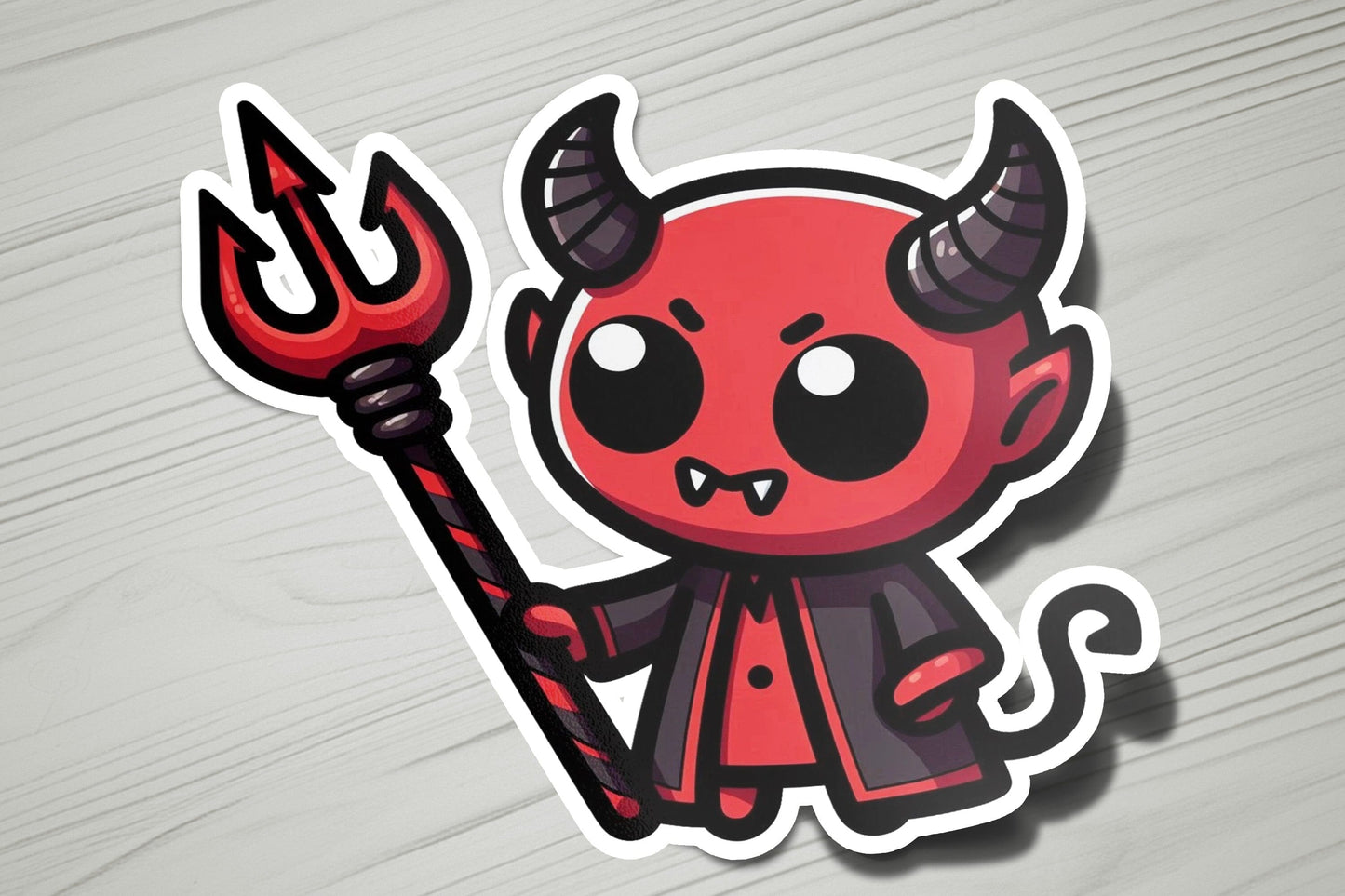 a sticker of a devil with horns holding a pitchfork