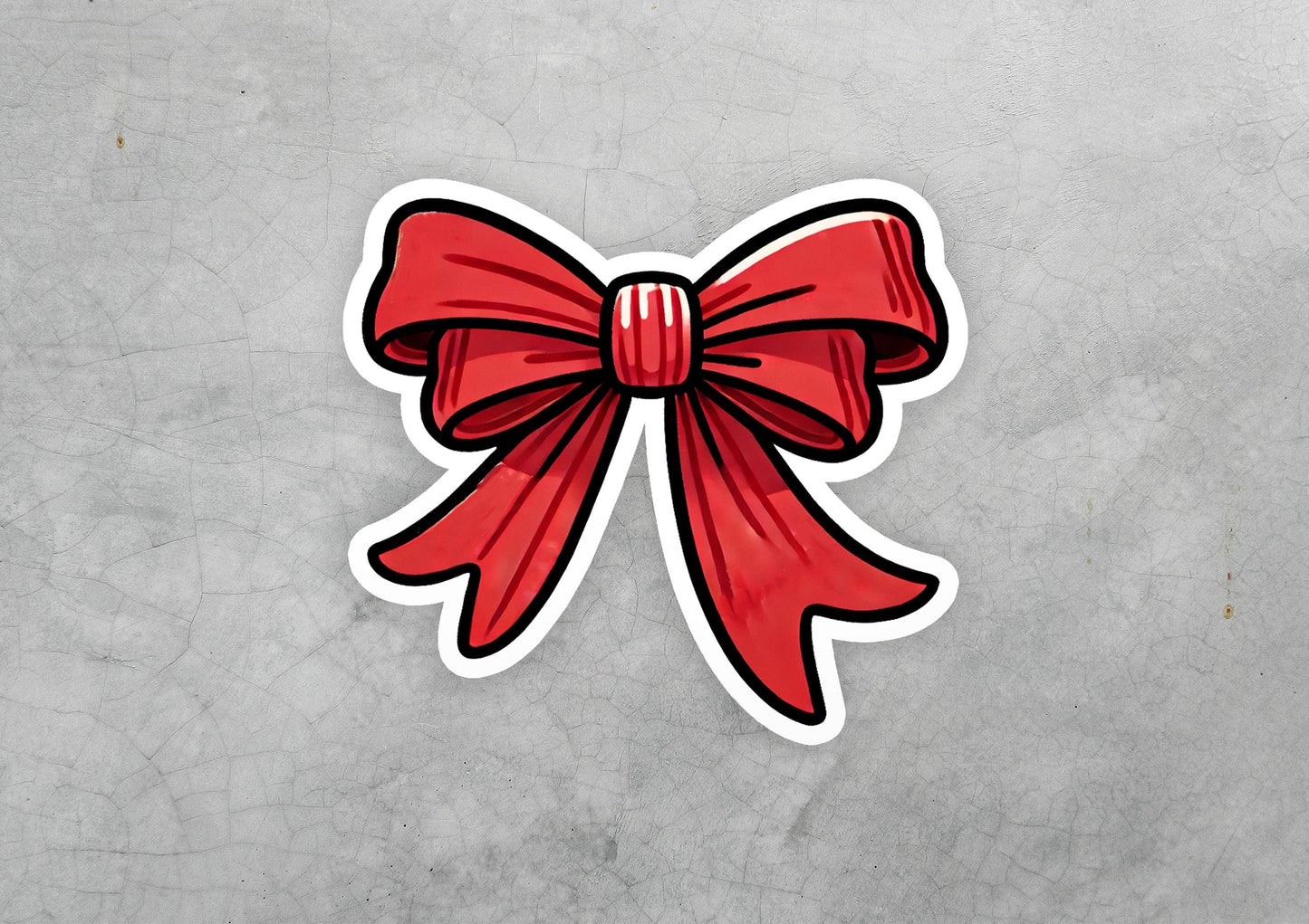 a sticker of a red bow on a gray background
