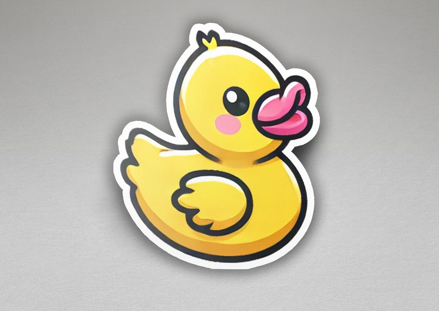 a sticker of a yellow rubber duck