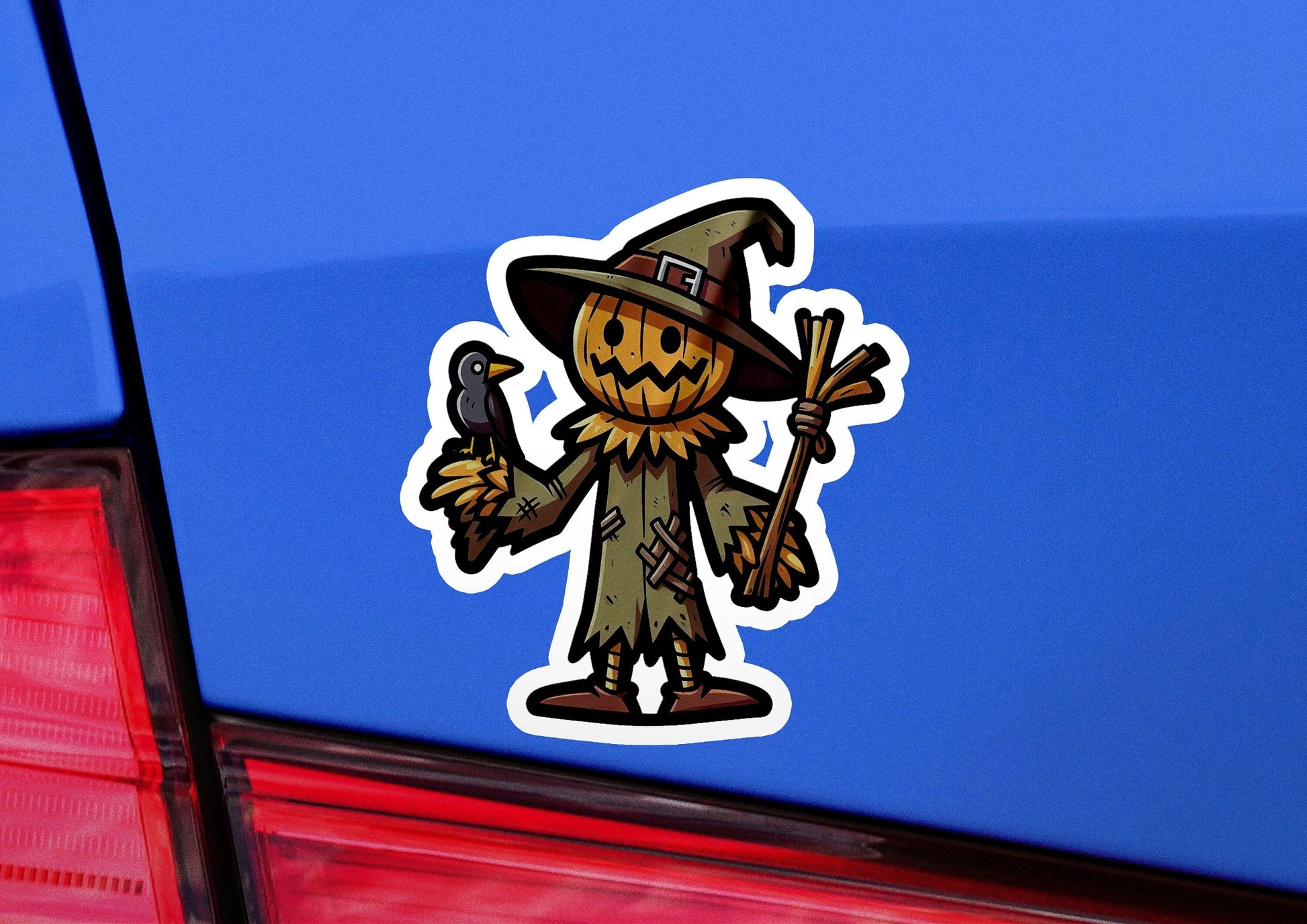 a car with a sticker of a scarecrow on it