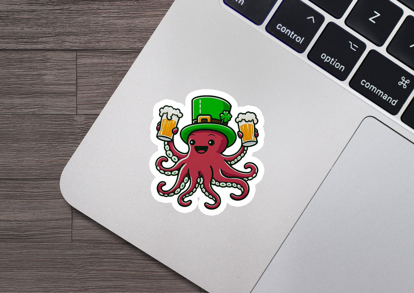 a laptop with a sticker of an octopus wearing a hat