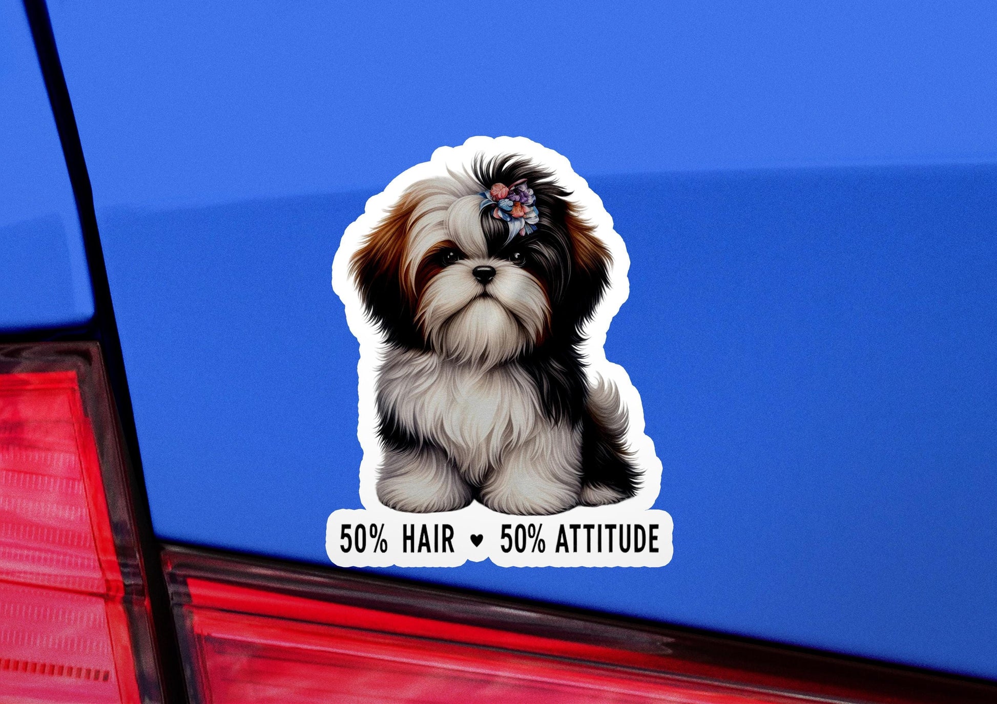 a sticker of a dog with a bow on it&#39;s head
