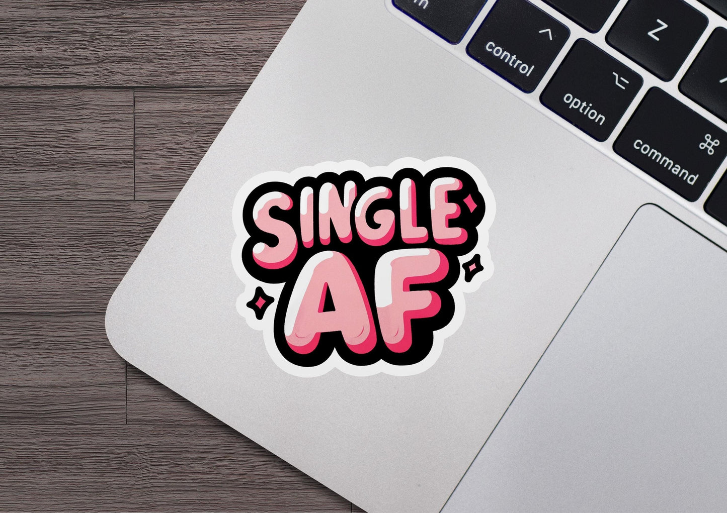 a sticker that says single af on a laptop
