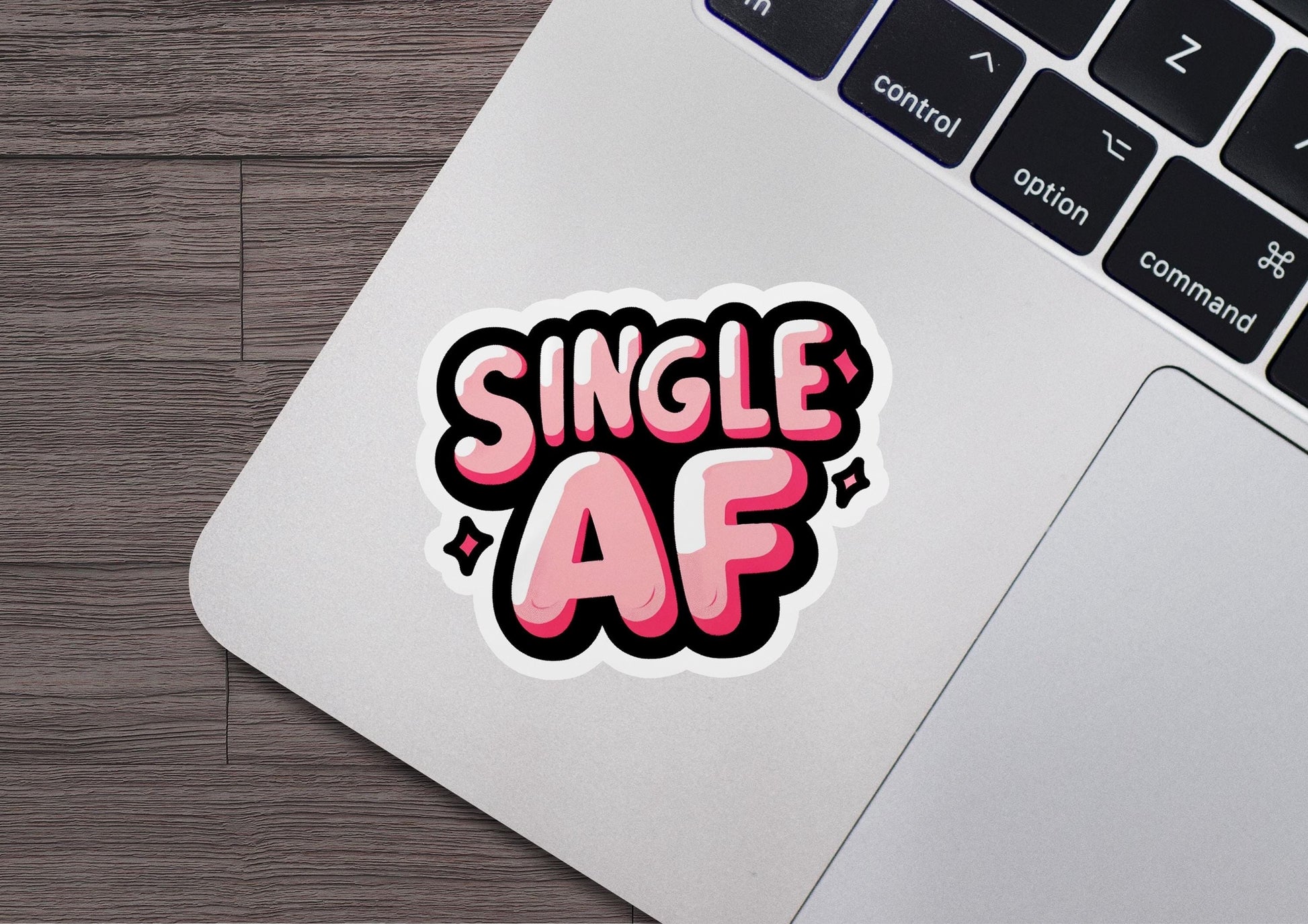 a sticker that says single af on a laptop