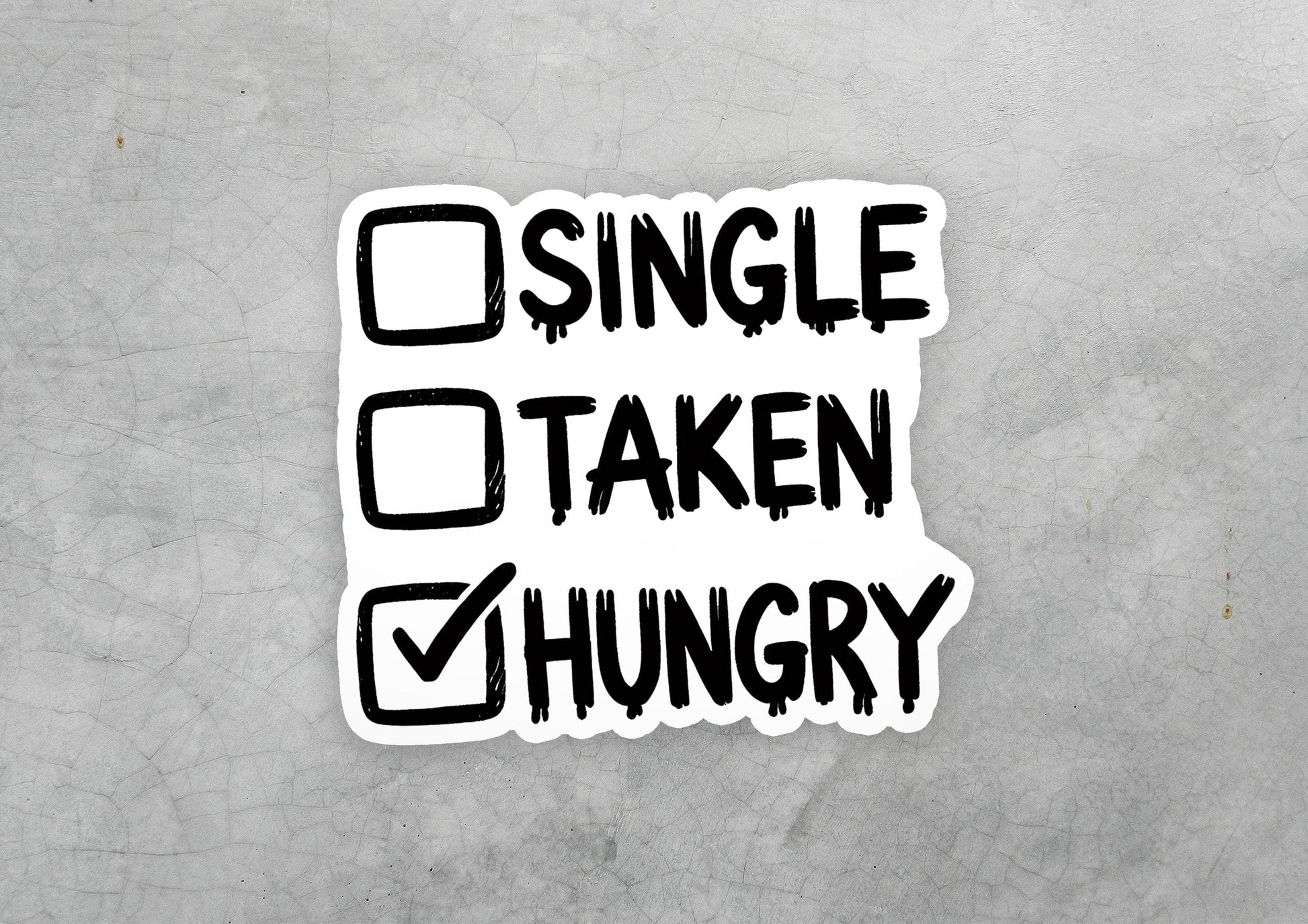 a sticker that says single taken hungry