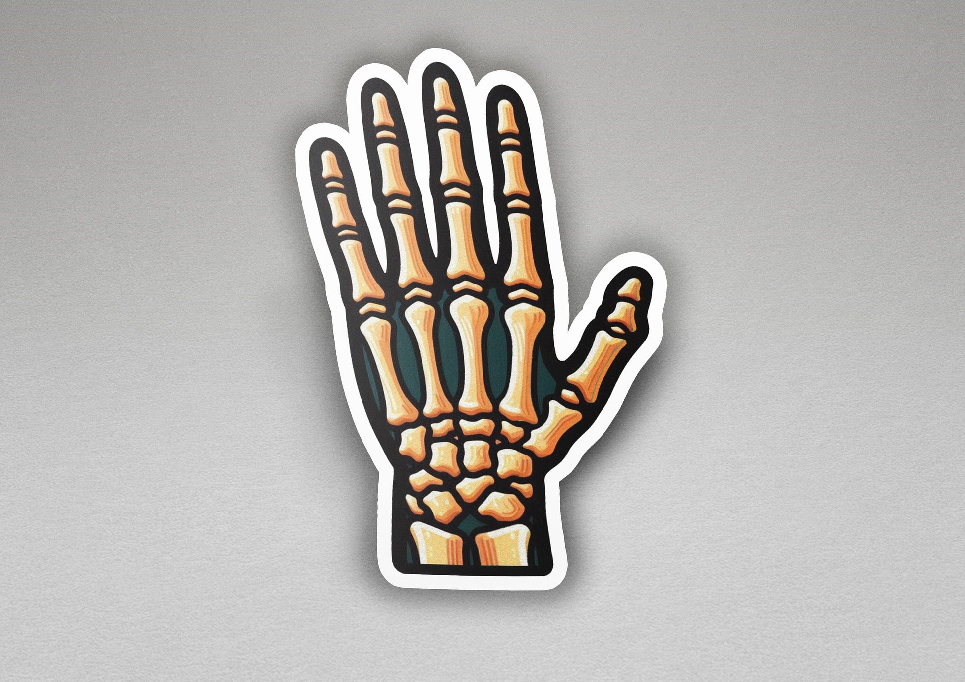 a sticker of a hand with a skeleton hand on it