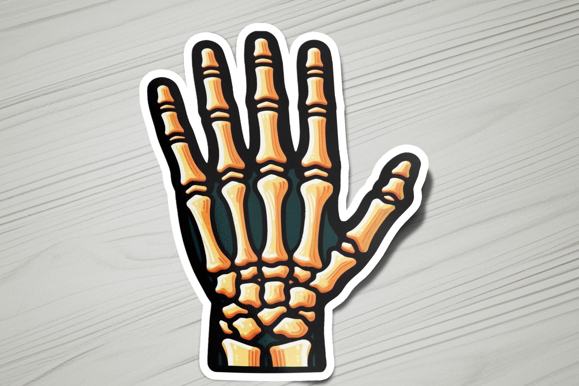 a sticker of a skeleton hand on a table