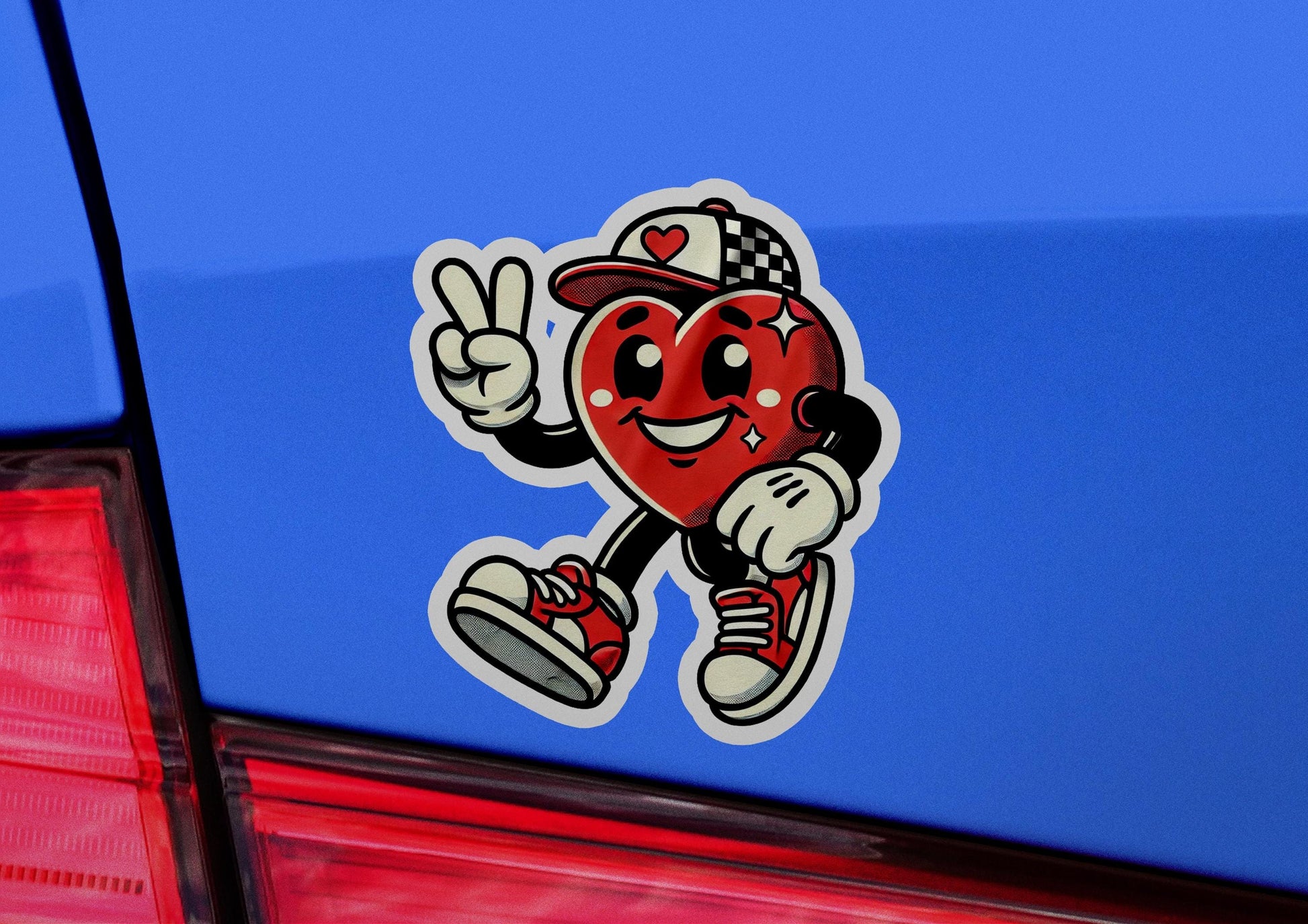 a car with a sticker of a heart running