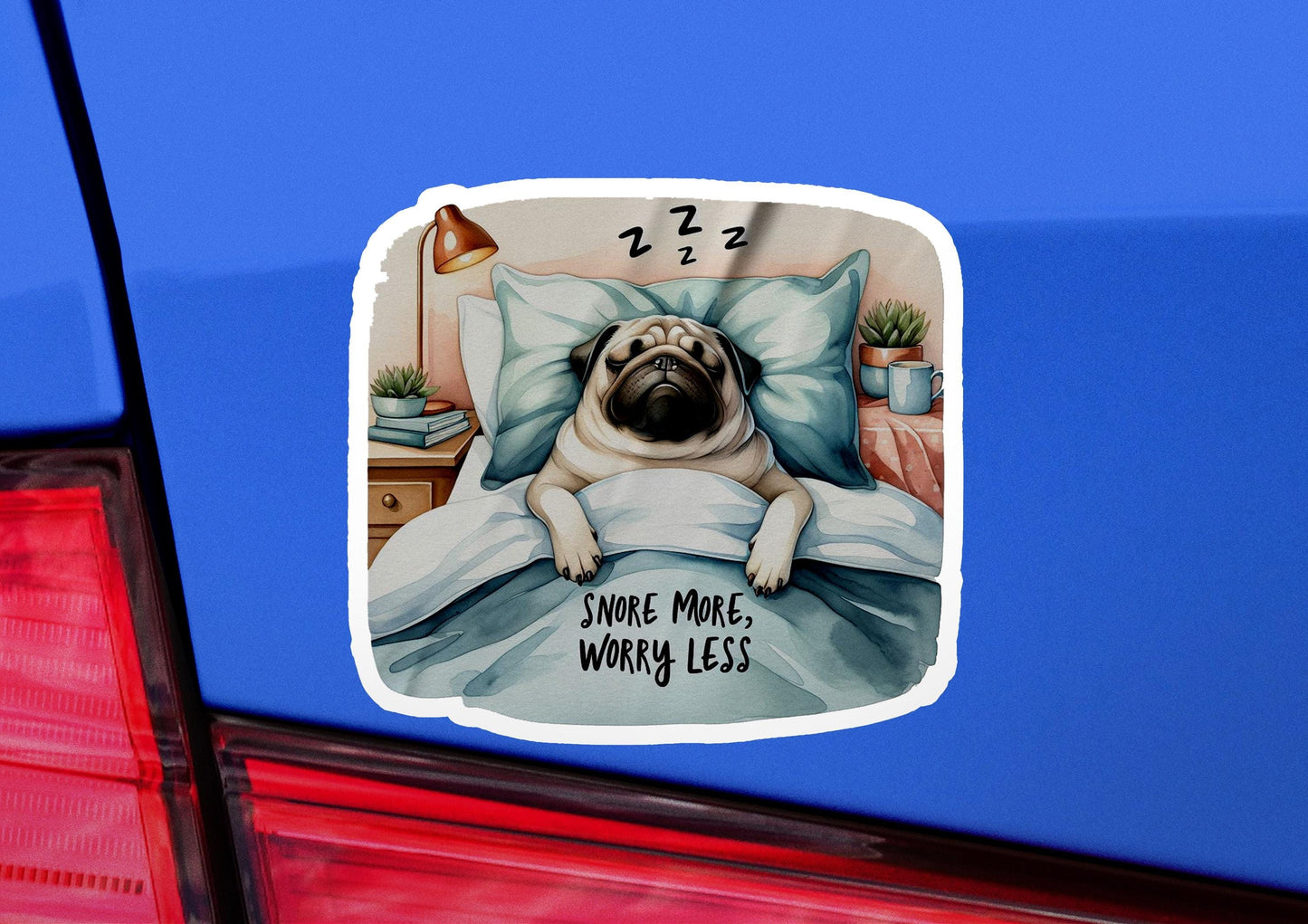 a sticker of a pug dog laying in bed