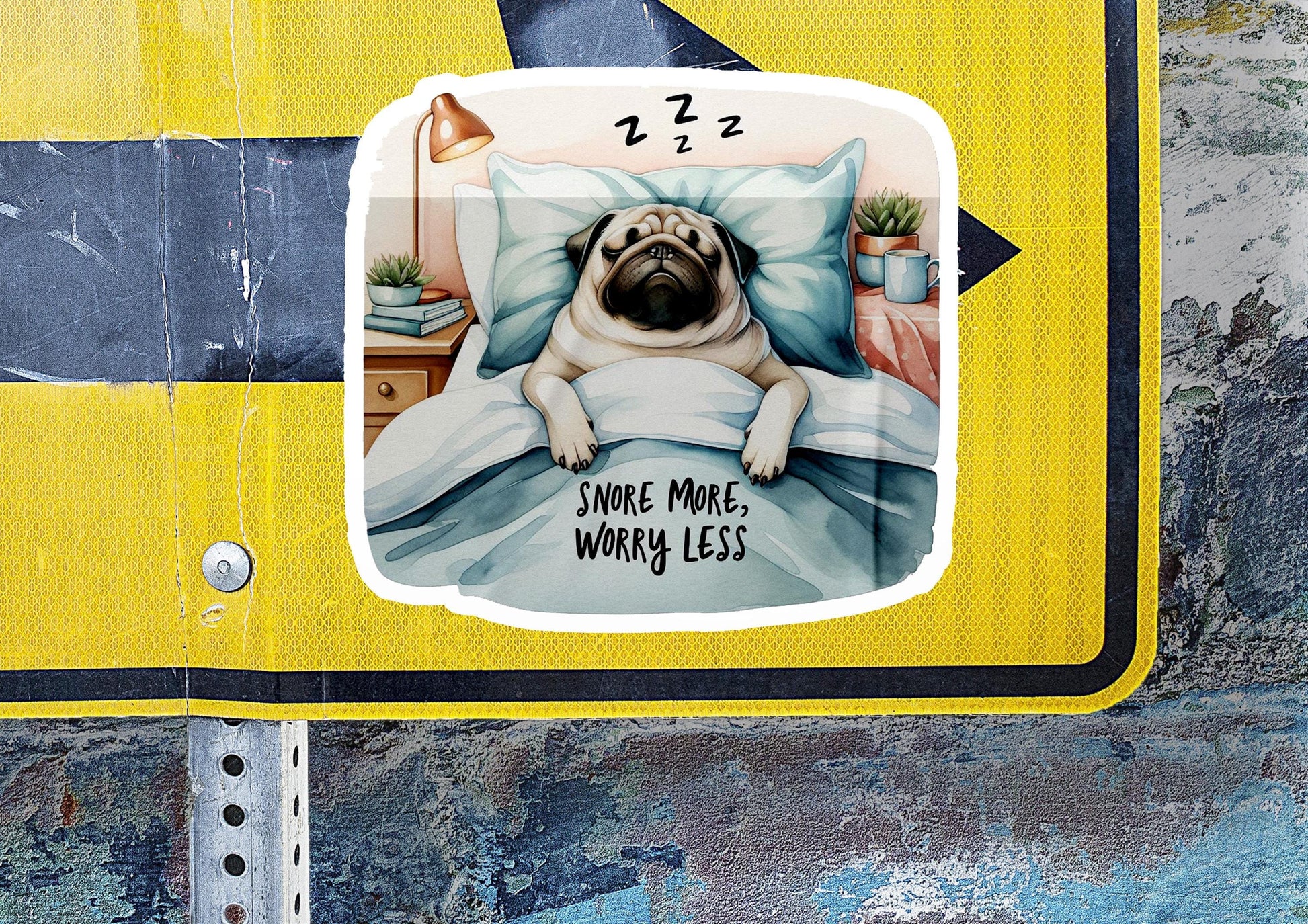 a sticker of a pug dog sleeping on a bed