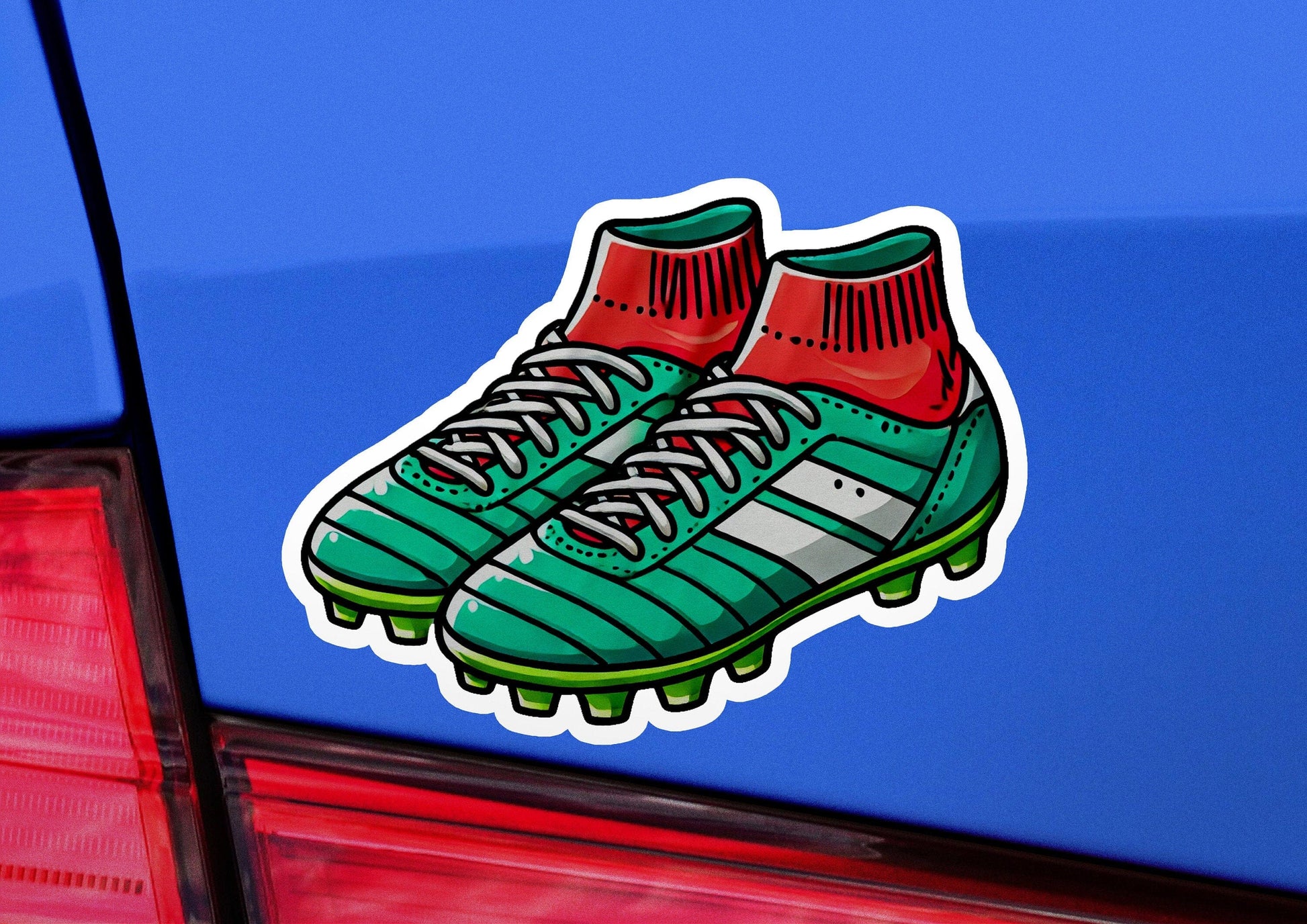 a pair of shoes sticker on the back of a car