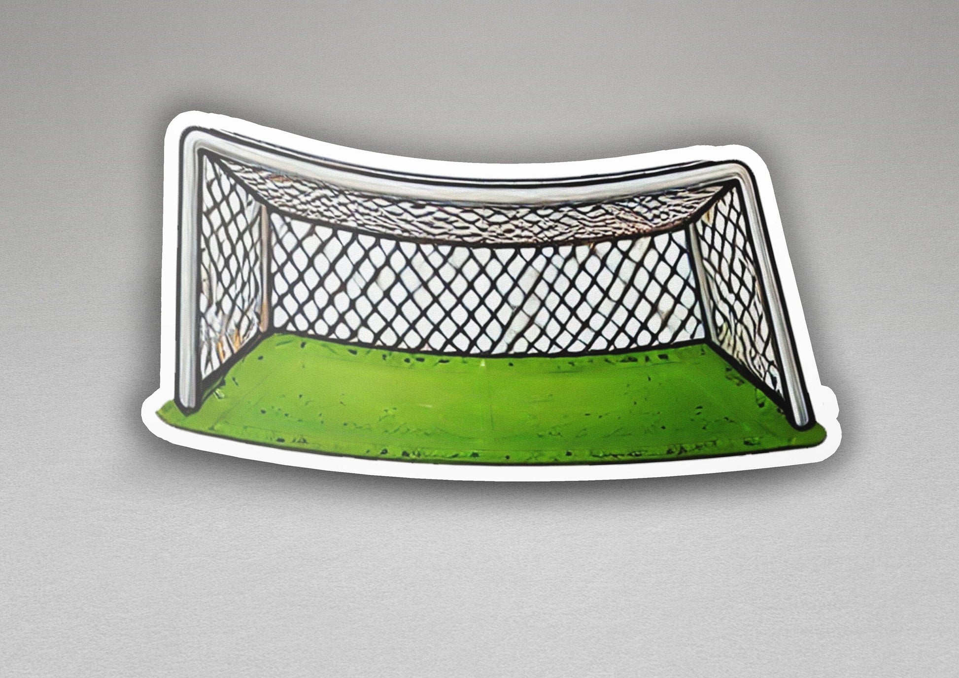 a sticker of a soccer goal with a green field