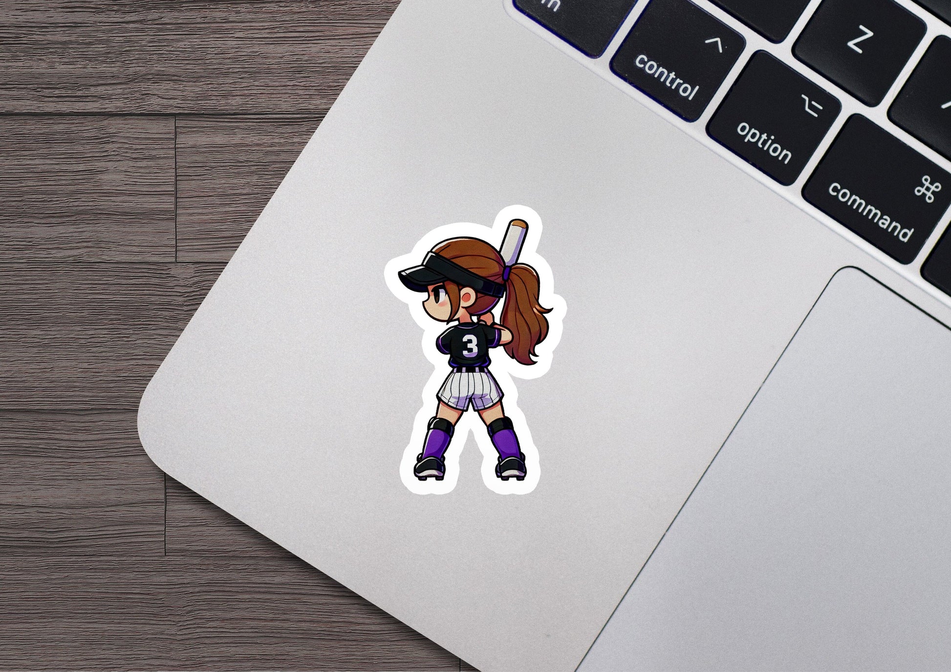 a sticker of a girl holding a baseball bat