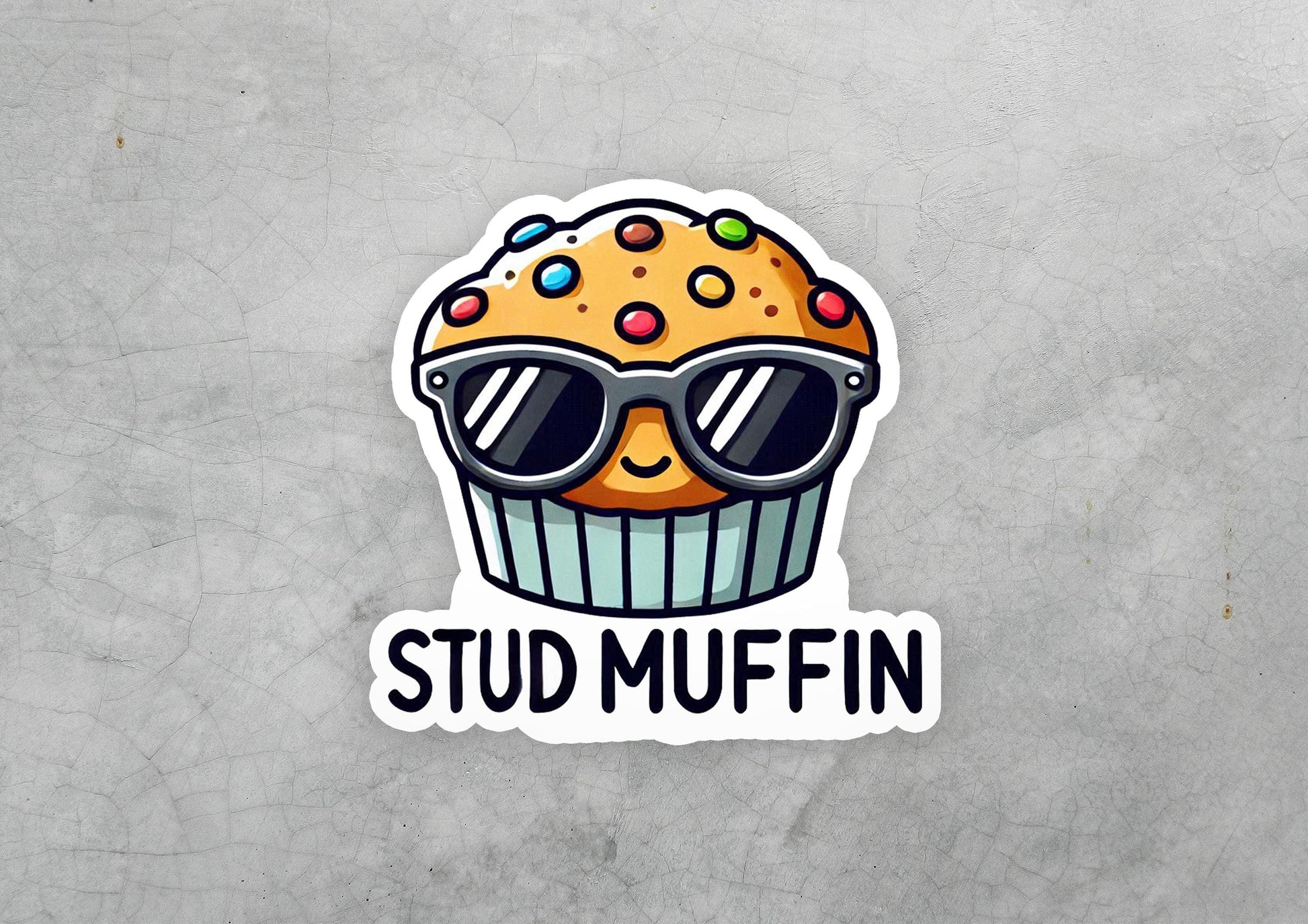 a sticker of a muffin with sunglasses on it