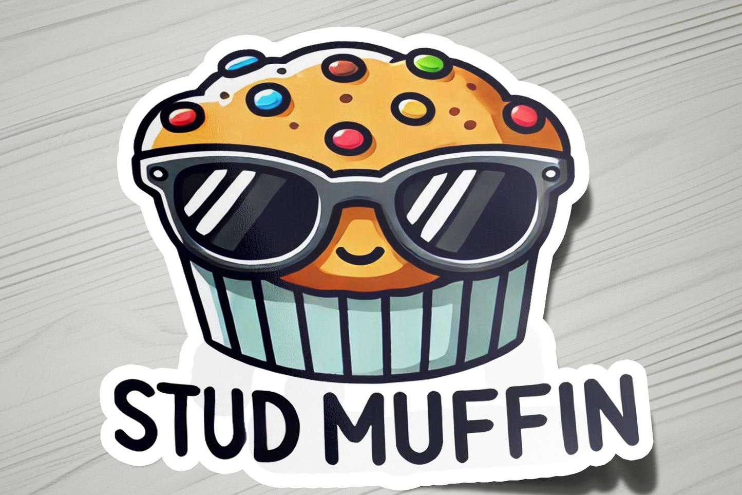 a sticker with a muffin wearing sunglasses