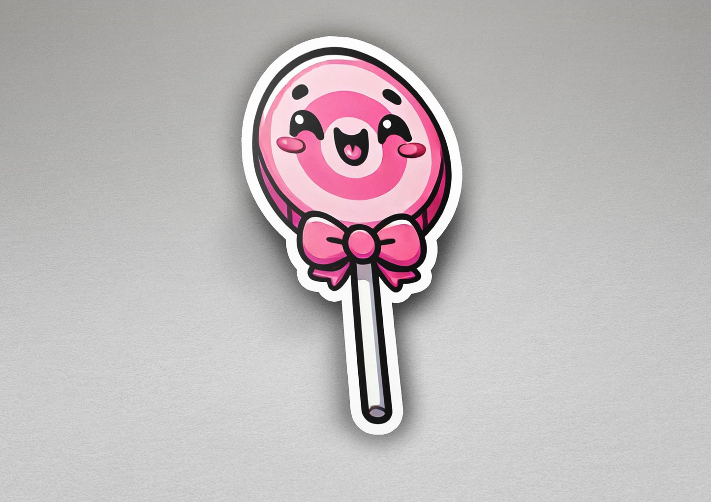 a sticker of a lollipop with a bow on it