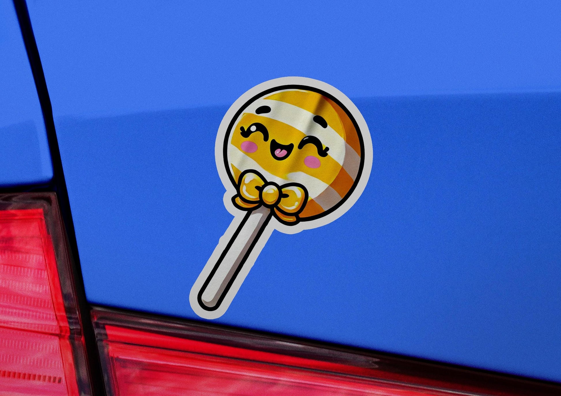 a sticker of a lollipop on the back of a car