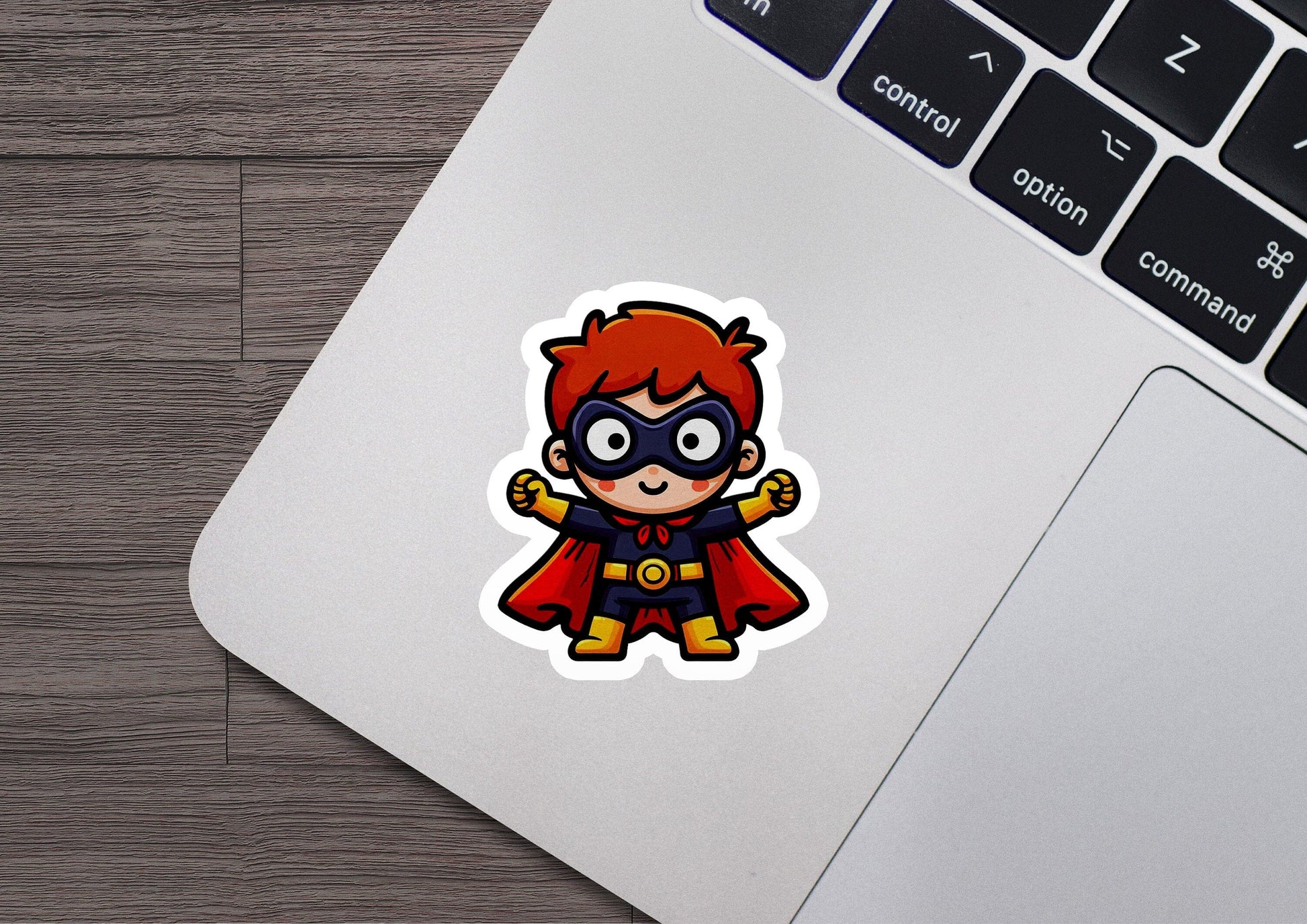 a laptop with a sticker of a cartoon character