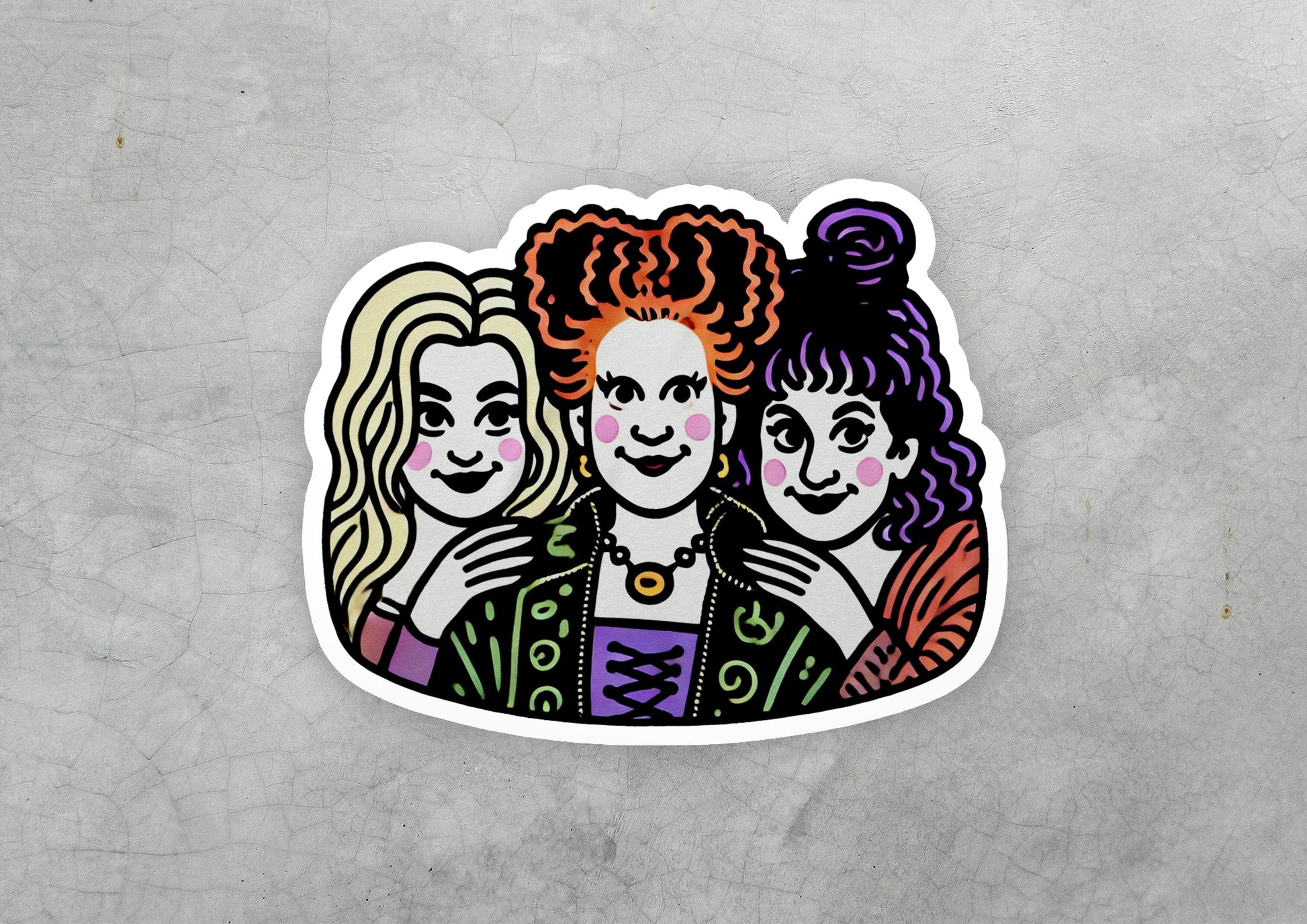 a sticker of three women with curly hair