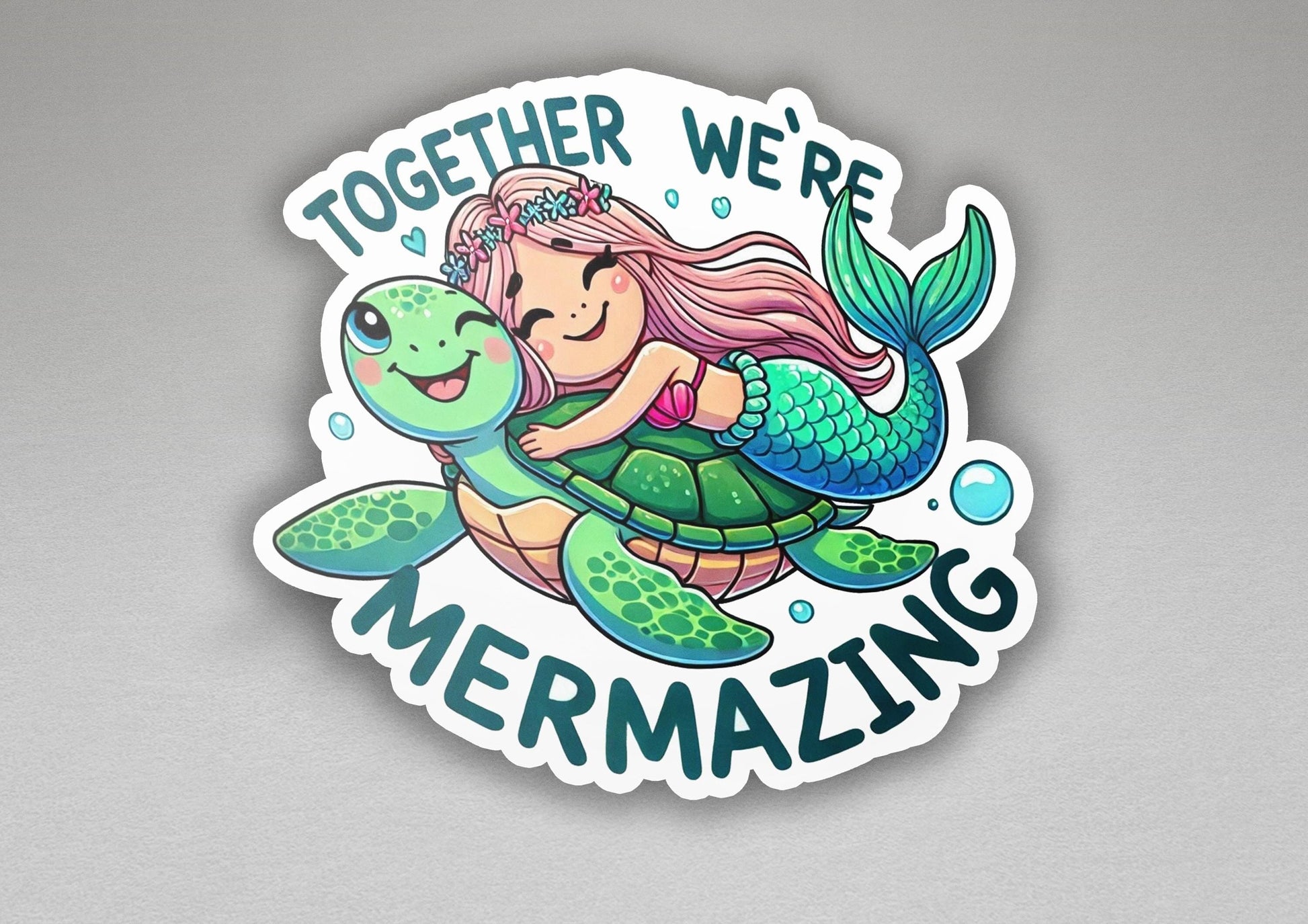 a sticker with a mermaid hugging a turtle