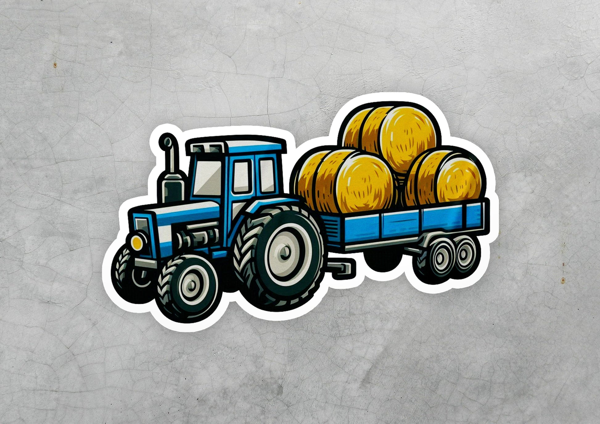 a sticker of a tractor with bales of hay