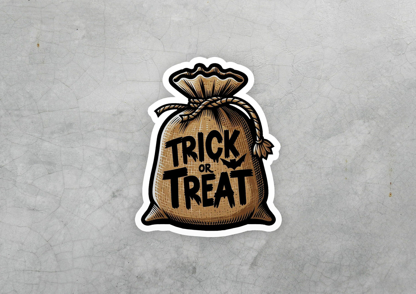 a sticker that says trick or treat in a bag