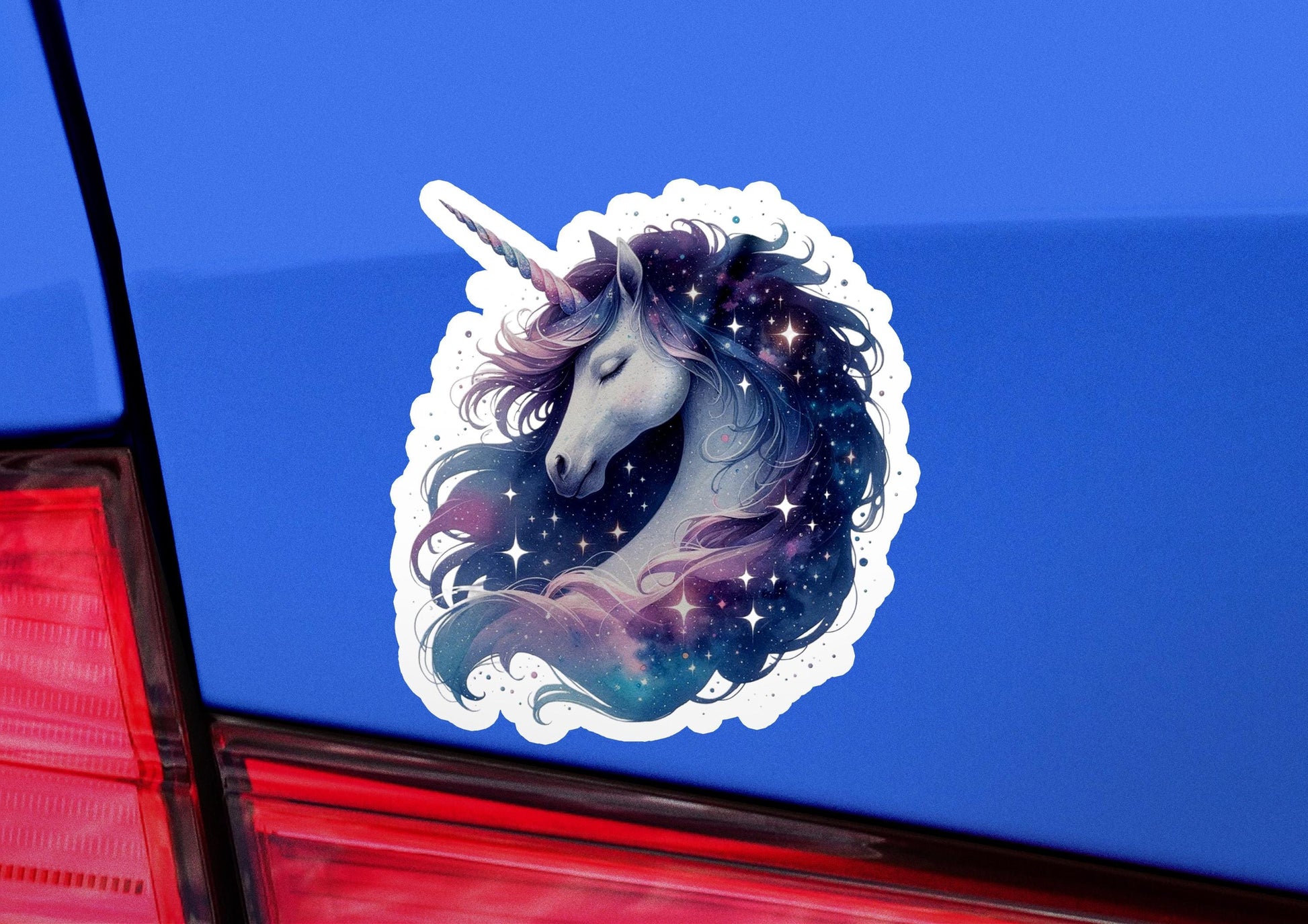 a sticker of a unicorn with stars on it