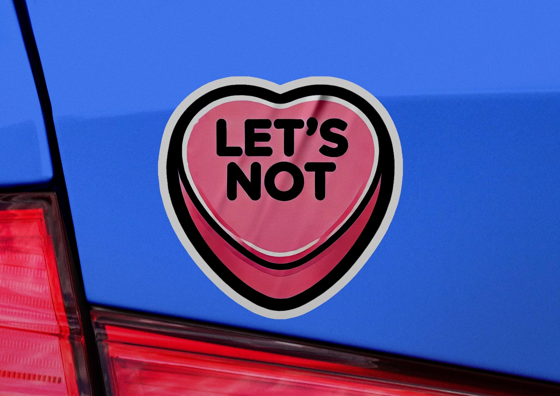 a sticker that says let's not on the back of a car