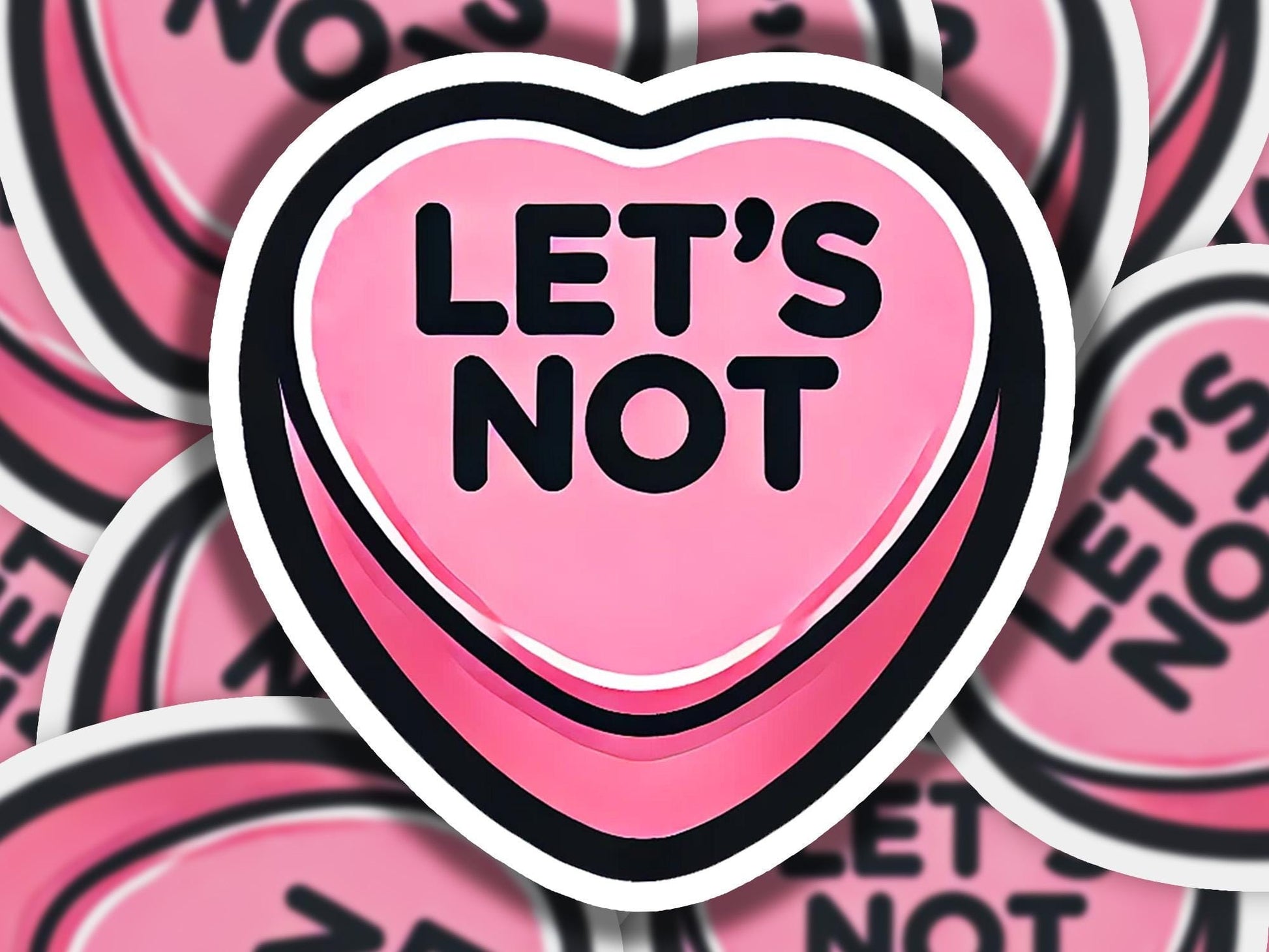 a bunch of pink stickers that say let's not