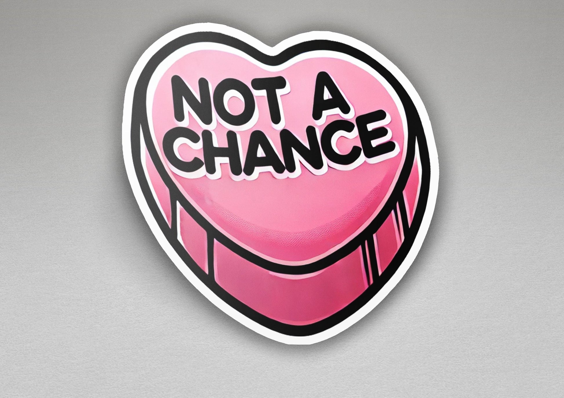 a heart shaped sticker with the words not a chance on it
