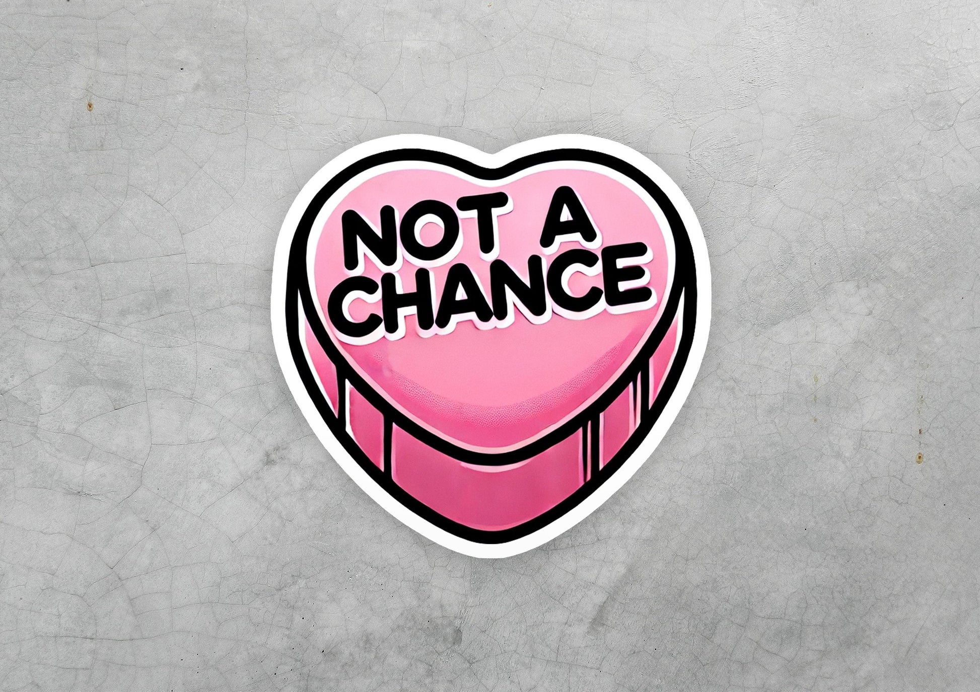 a heart shaped sticker with the words not a chance on it