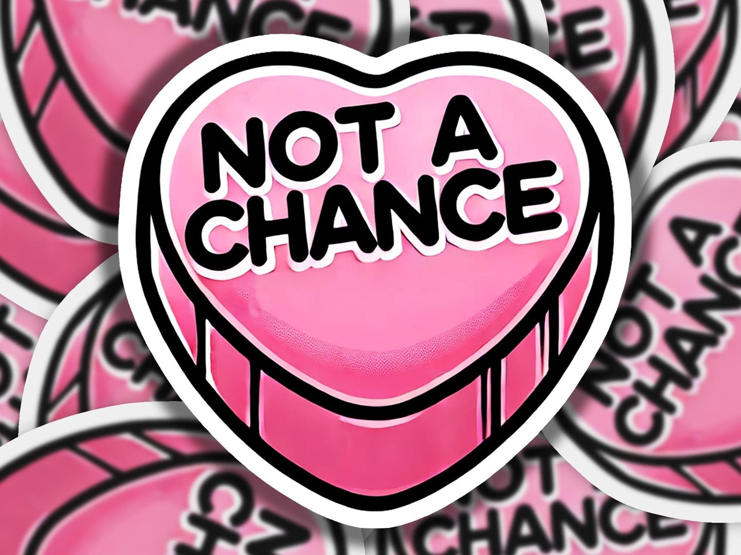 a heart shaped sticker with the words not a chance on it