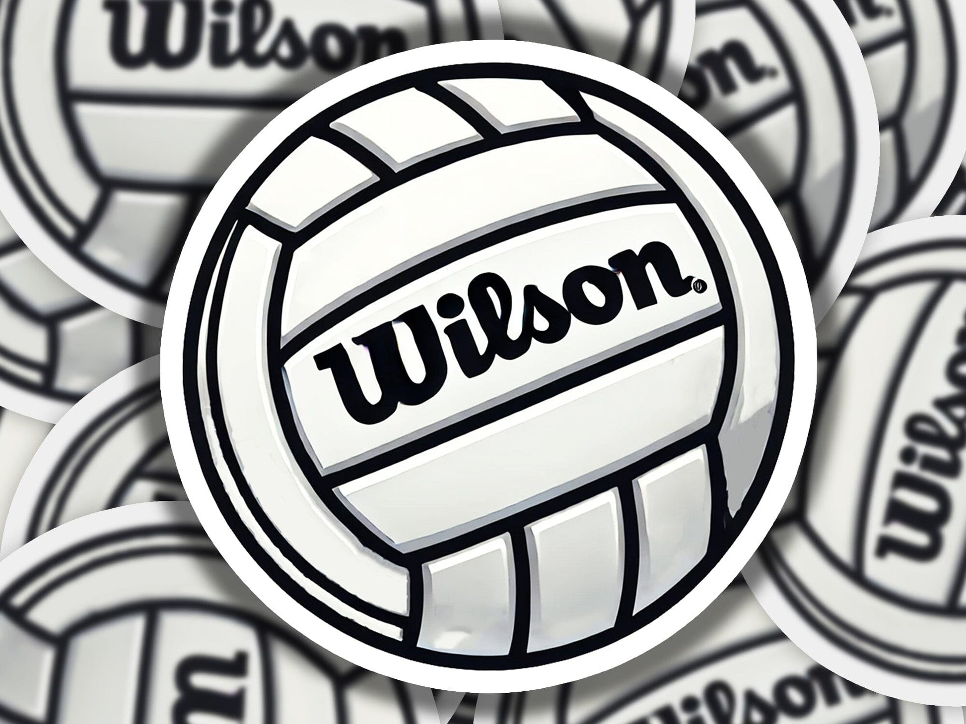 a pile of wilson volleyball stickers sitting on top of each other
