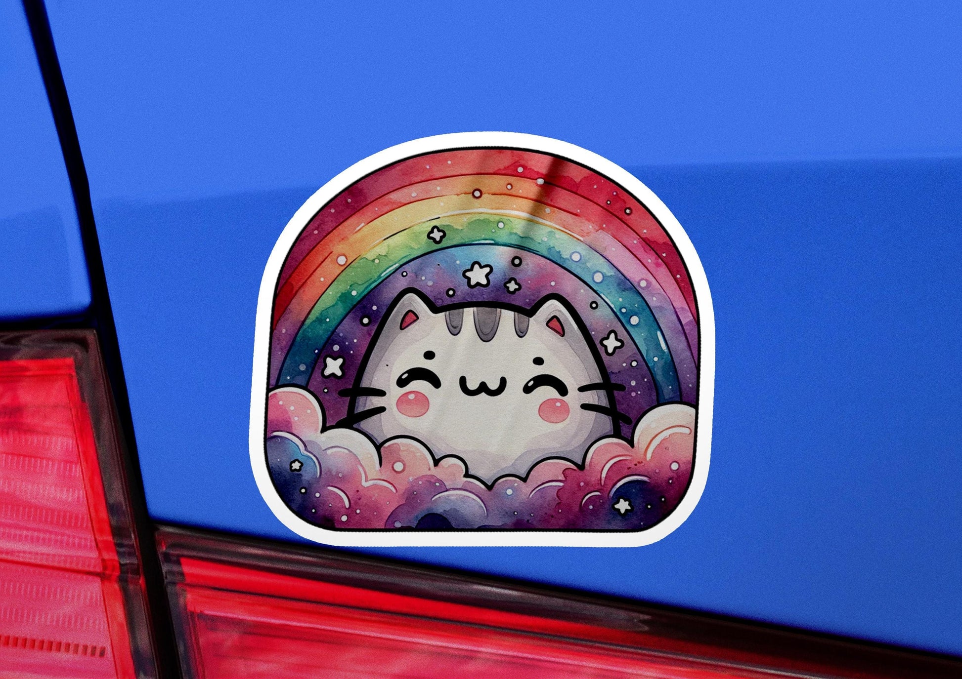 a sticker of a cat with a rainbow in the background