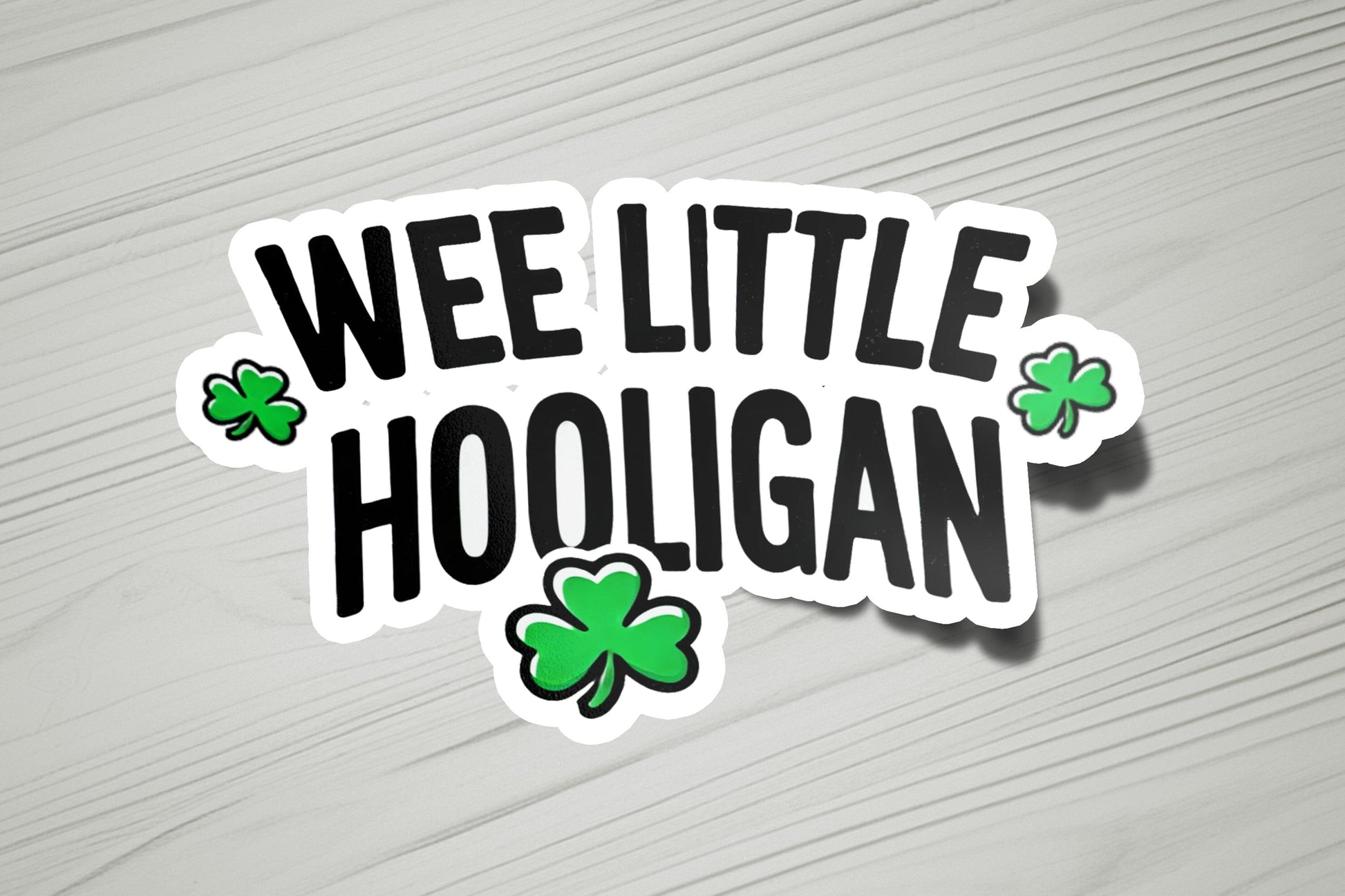 a sticker that says wee little hooligan
