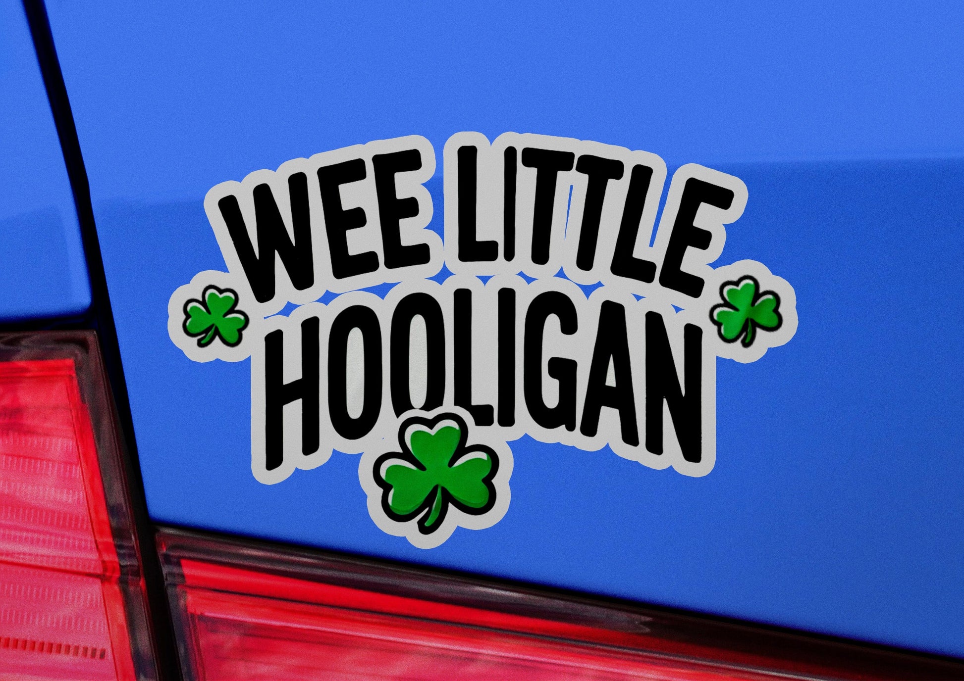 a car with a sticker that says wee little hooligan
