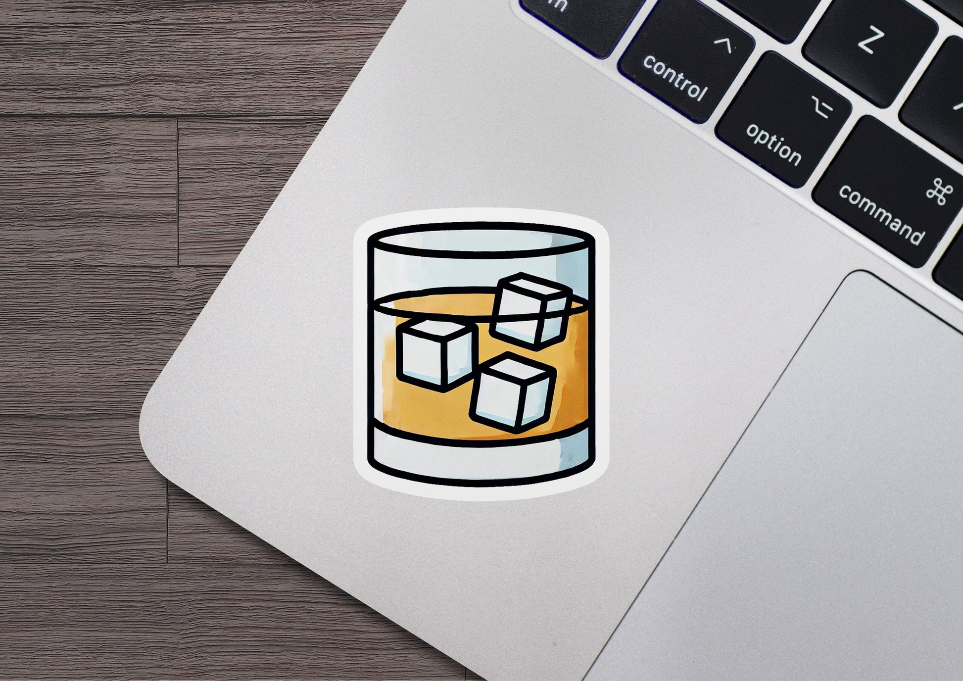 a sticker of a glass of beer on a laptop