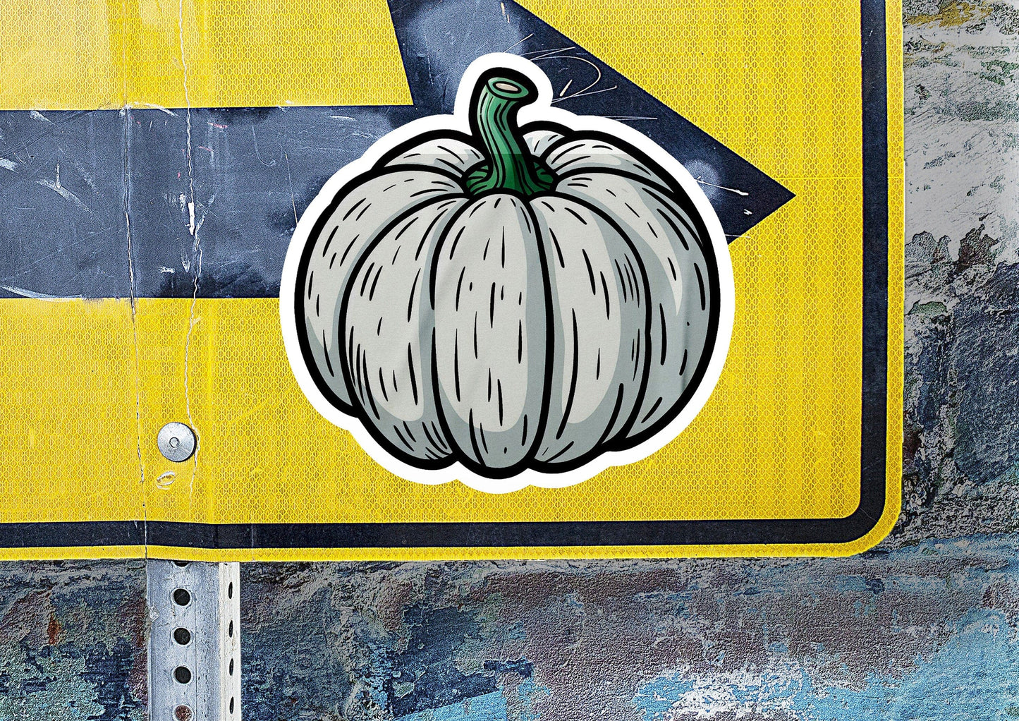 a street sign with a picture of a pumpkin on it