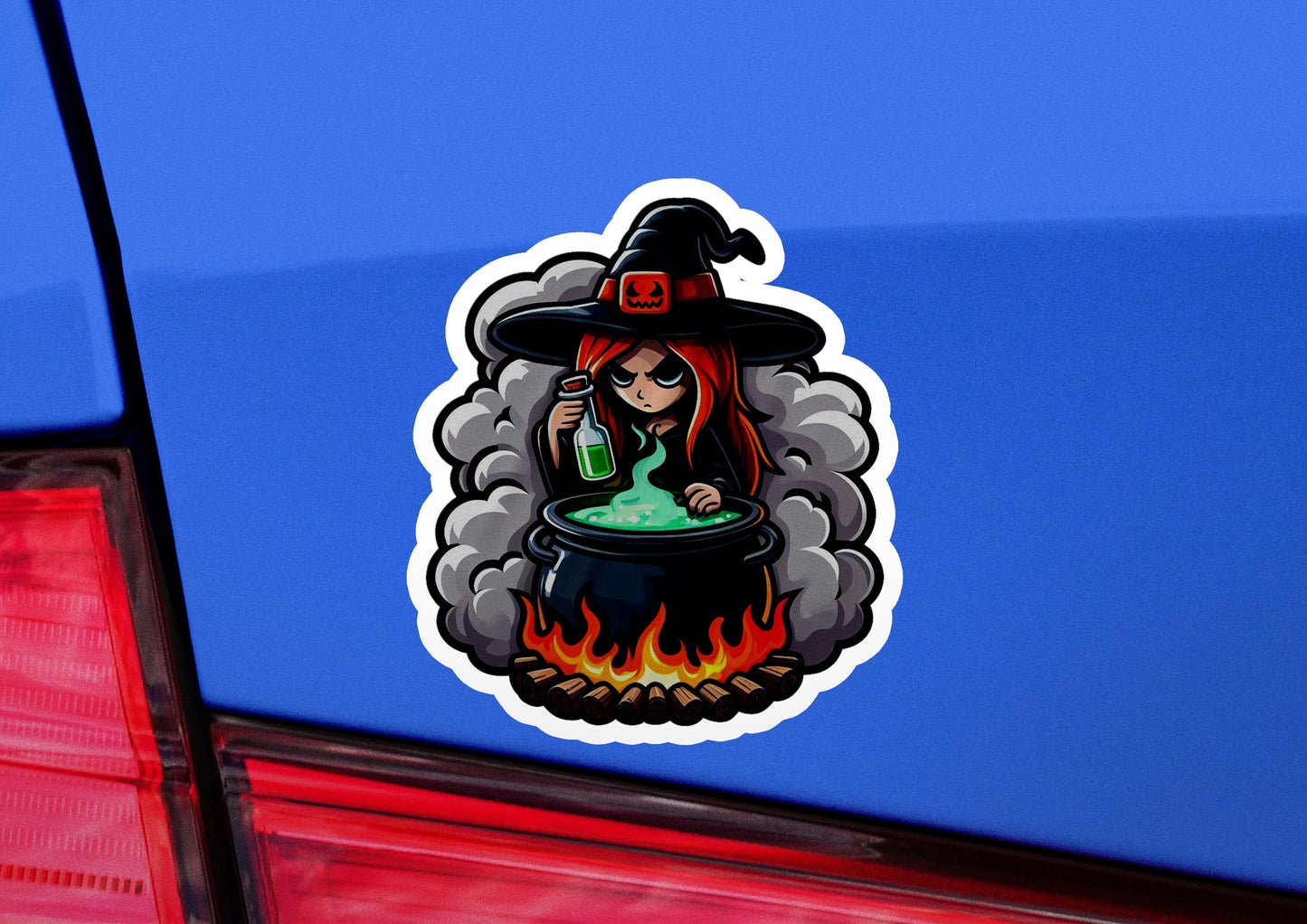 a sticker of a witch stirring a caulder
