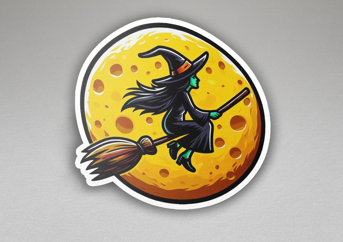a sticker of a witch flying on a broom