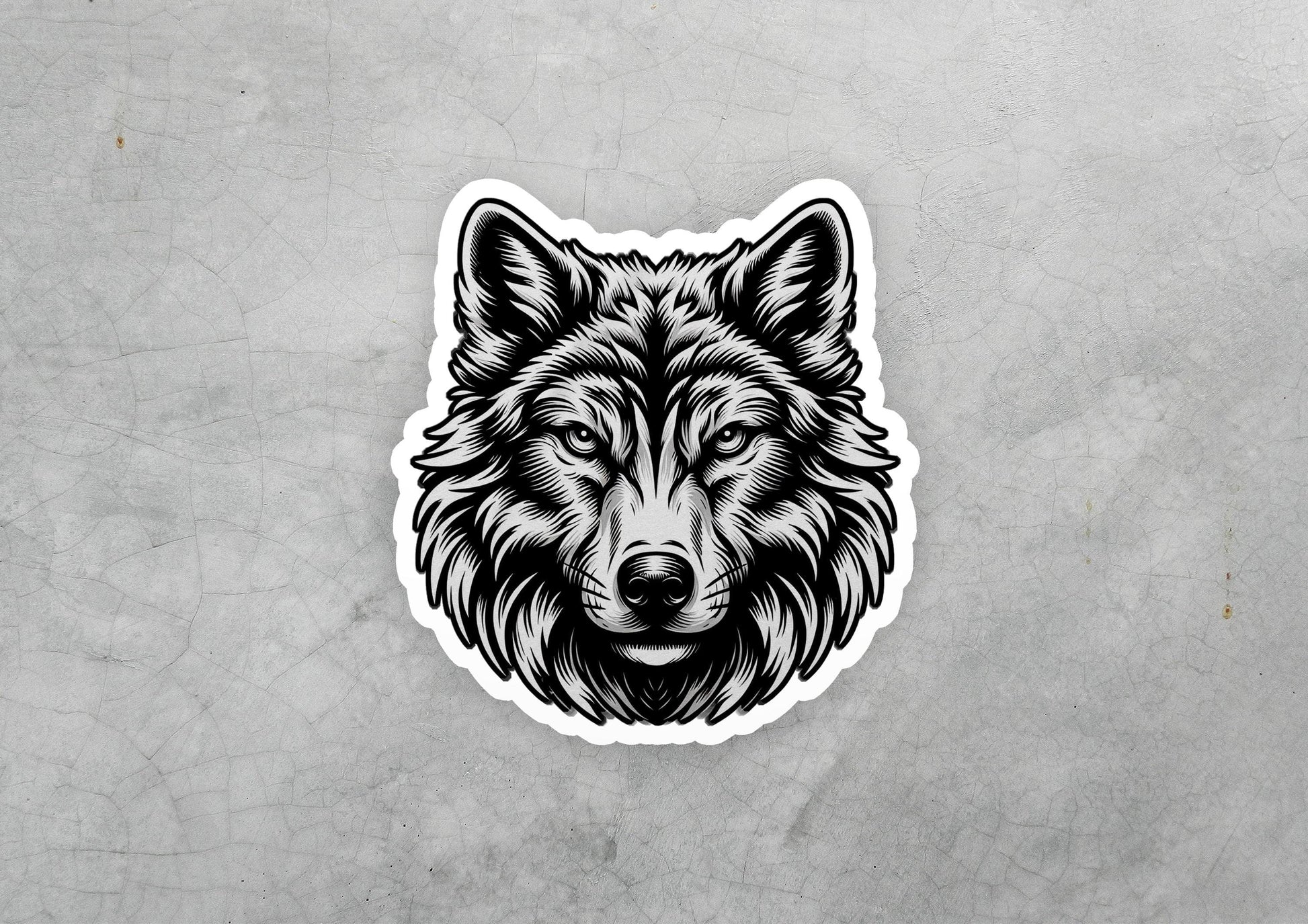 a sticker of a wolf&#39;s head on a gray background