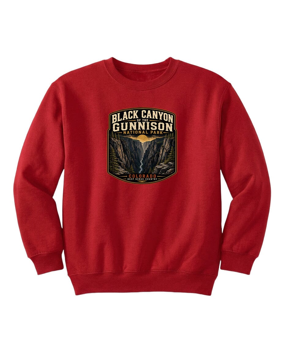 A red sweatshirt with a graphic design depicting the Black Canyon of the Gunnison National Park.