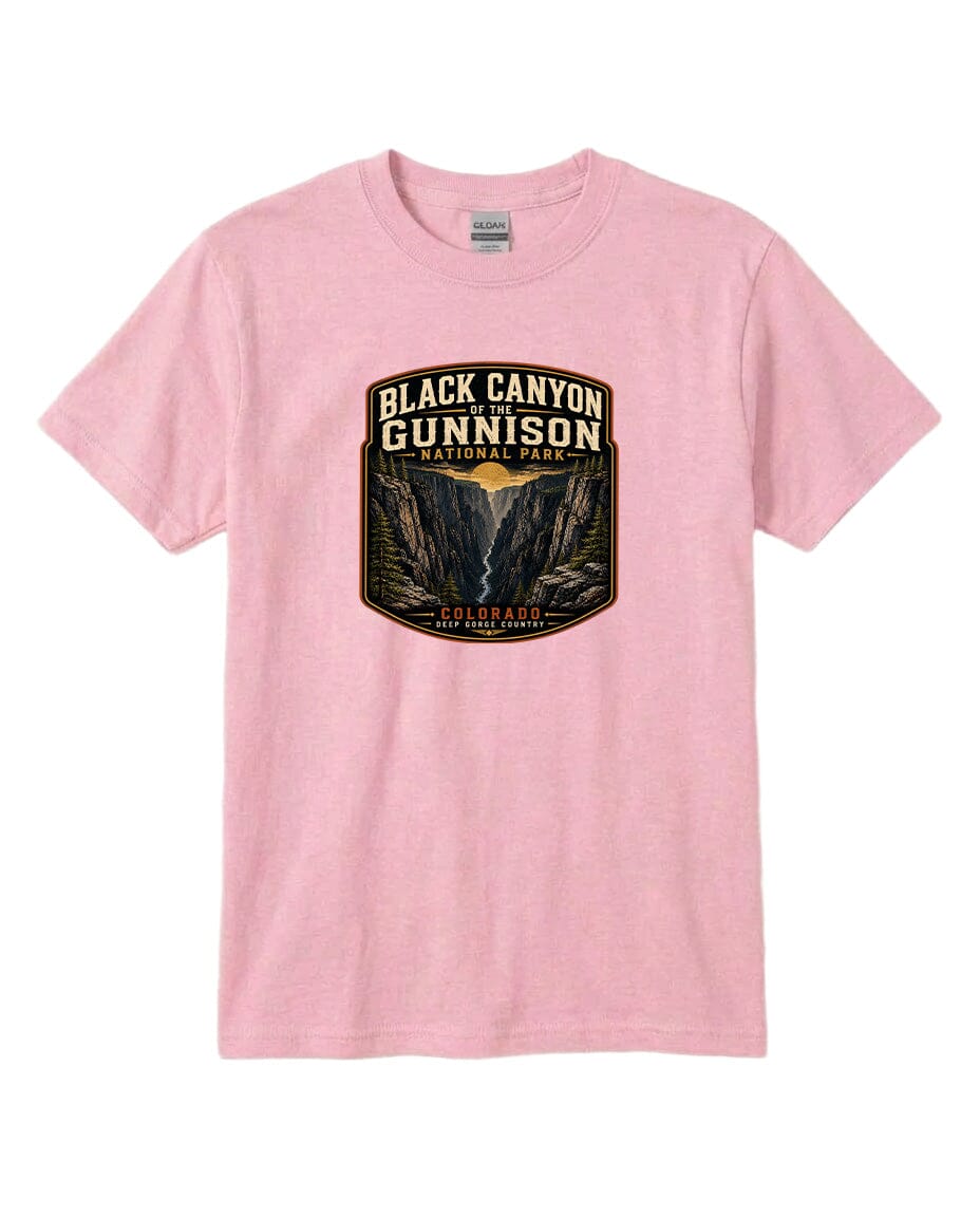A pink t-shirt with a graphic design depicting the Black Canyon of the Gunnison National Park.