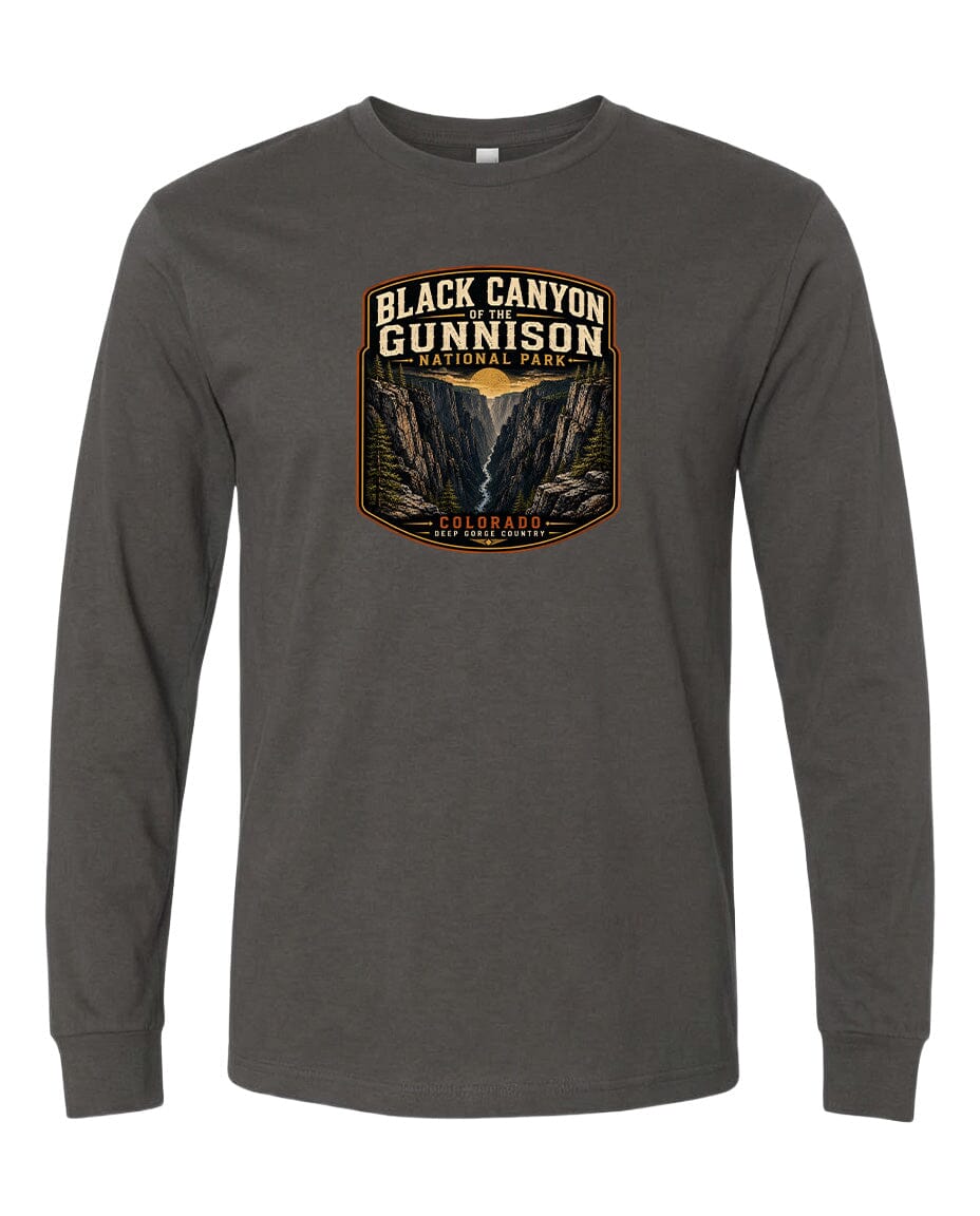 A gray long-sleeved t-shirt with a graphic design depicting the Black Canyon of the Gunnison National Park in Colorado.