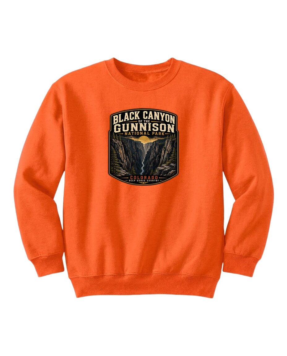 An orange sweatshirt with a graphic design depicting the Black Canyon of the Gunnison National Park.