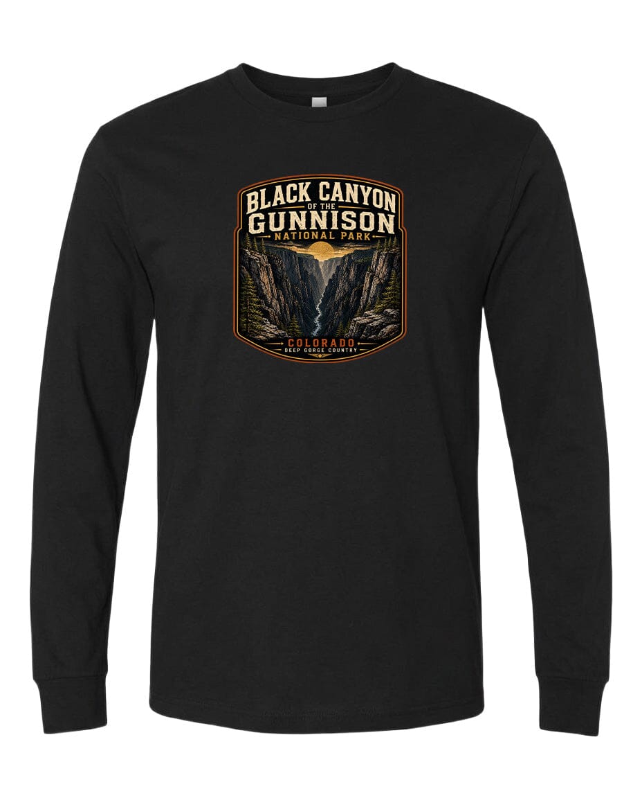 A black long-sleeve t-shirt with a graphic design depicting the Black Canyon of the Gunnison National Park in Colorado.