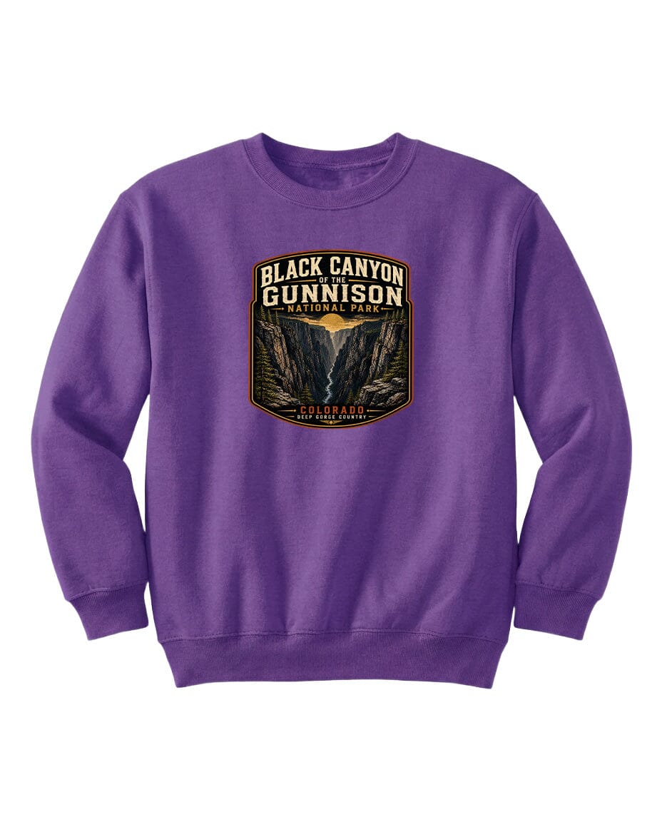 A purple sweatshirt with a graphic design depicting the Black Canyon of the Gunnison National Park.