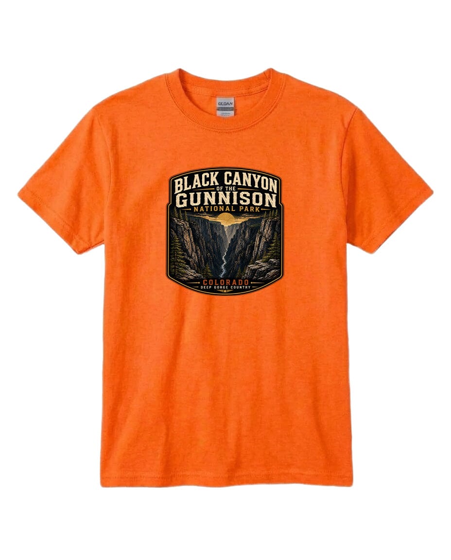 An orange t-shirt with a graphic design depicting the Black Canyon of the Gunnison National Park.