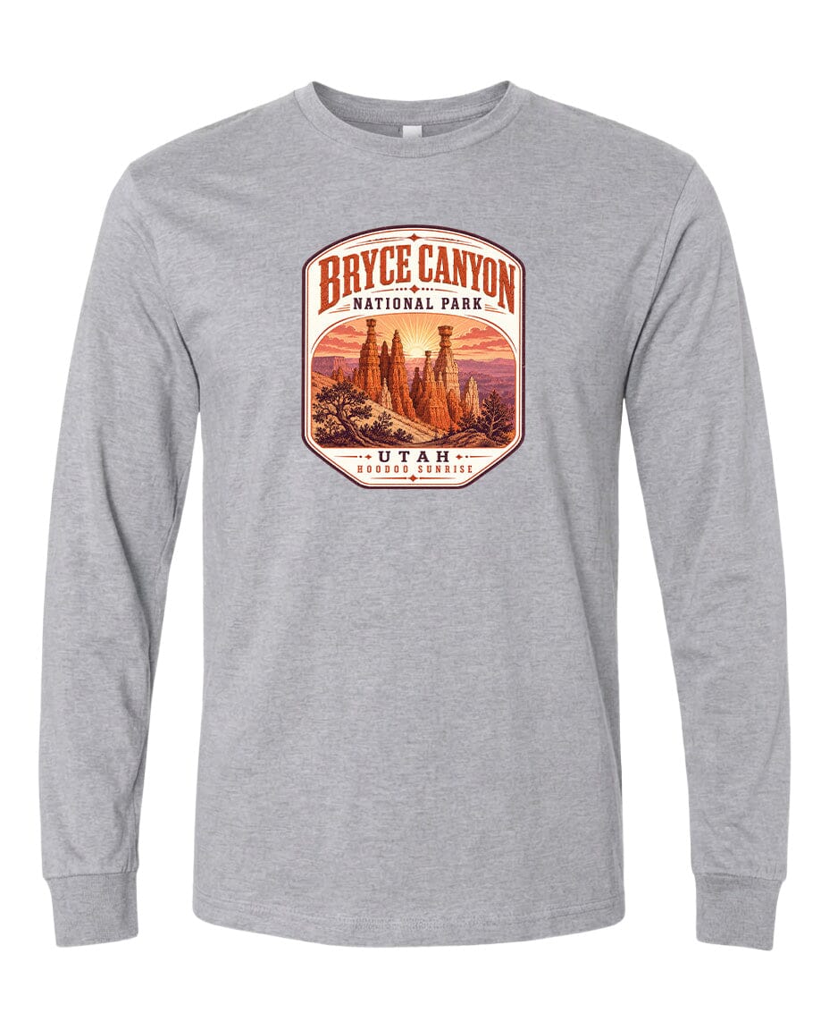 A gray long-sleeved t-shirt with a graphic design depicting the Bryce Canyon National Park in Utah.