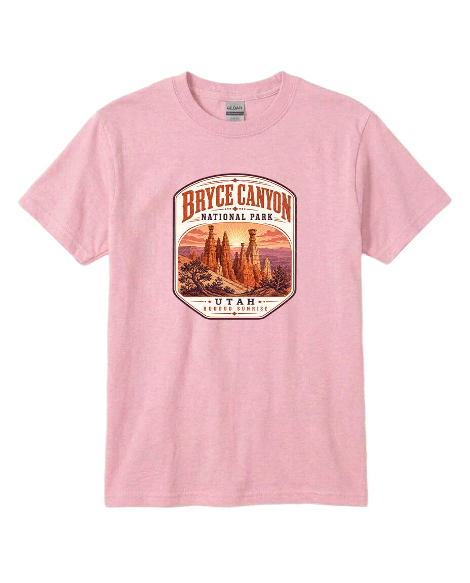 A pink t-shirt with a graphic design depicting the Bryce Canyon National Park in Utah.
